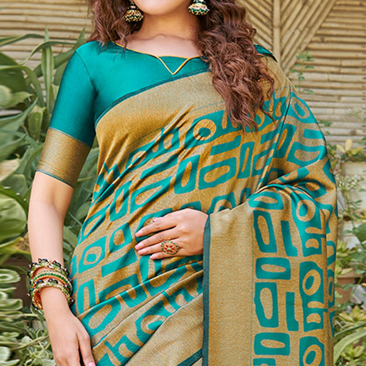Impressive Teal Blue Colored Festive Wear Floral Woven Silk Blend Saree With Tassels - Peachmode