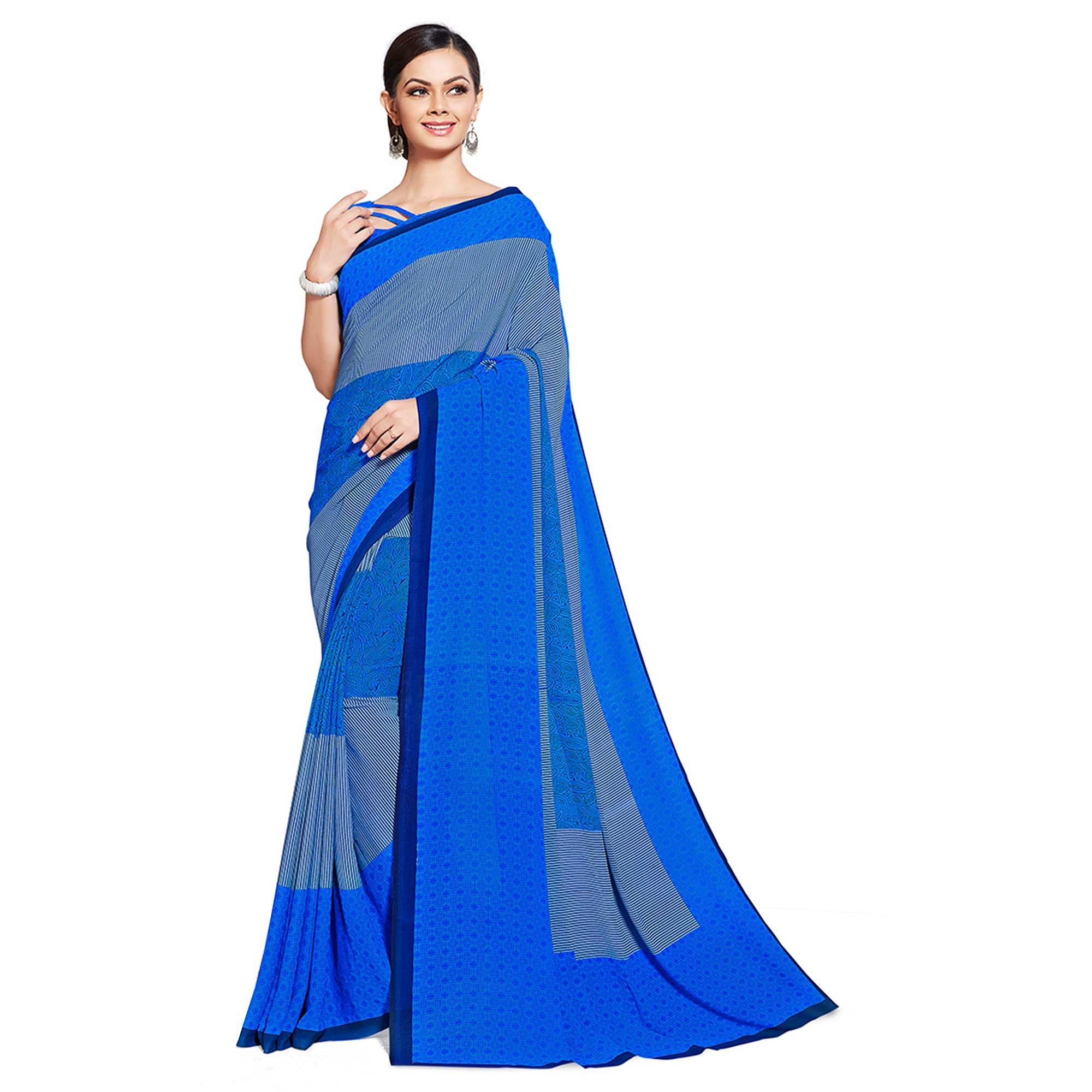 Innovative Blue Colored Casual Printed Georgette Saree - Peachmode