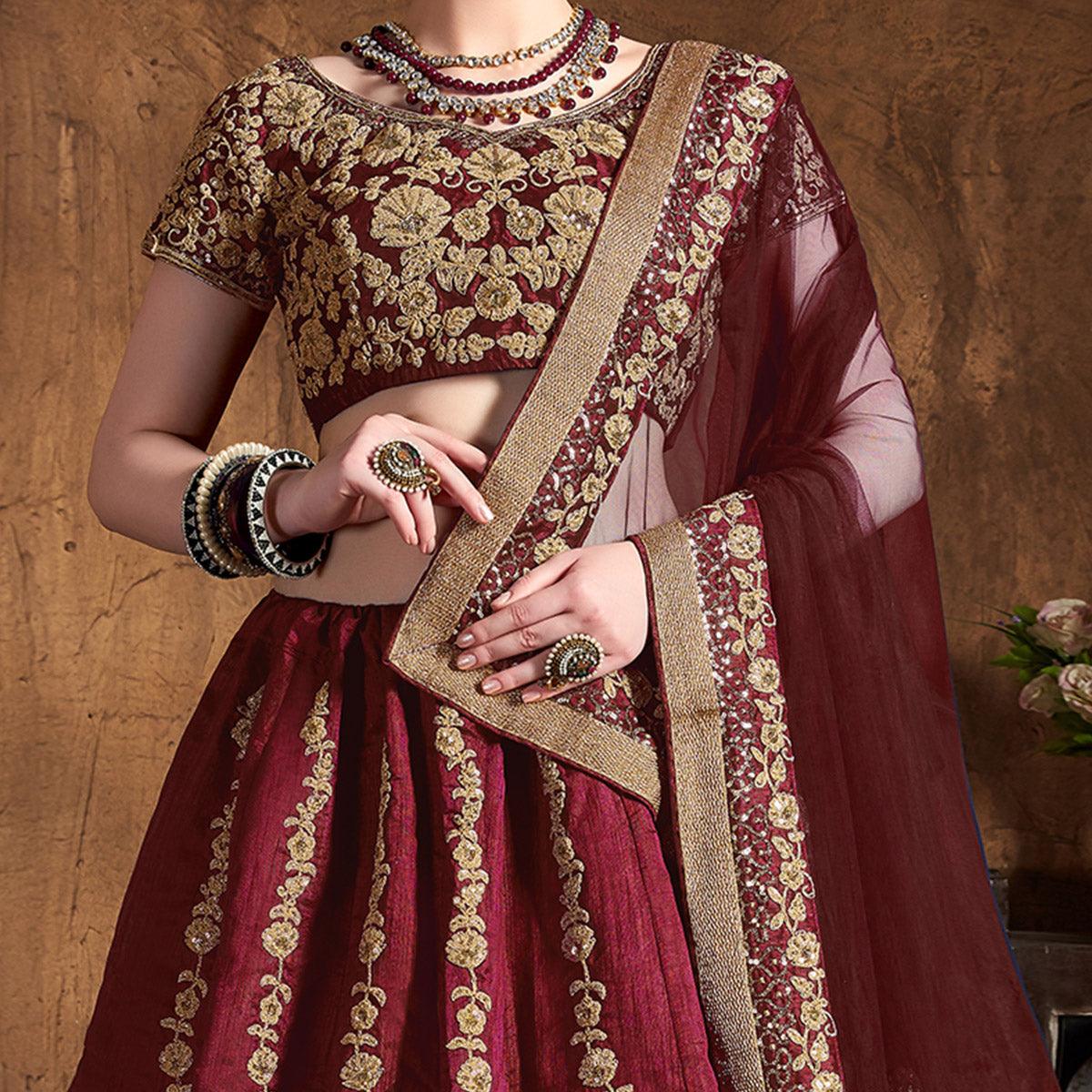 Innovative Maroon Colored Wedding Wear Embroidered Raw Silk Lehenga - Peachmode