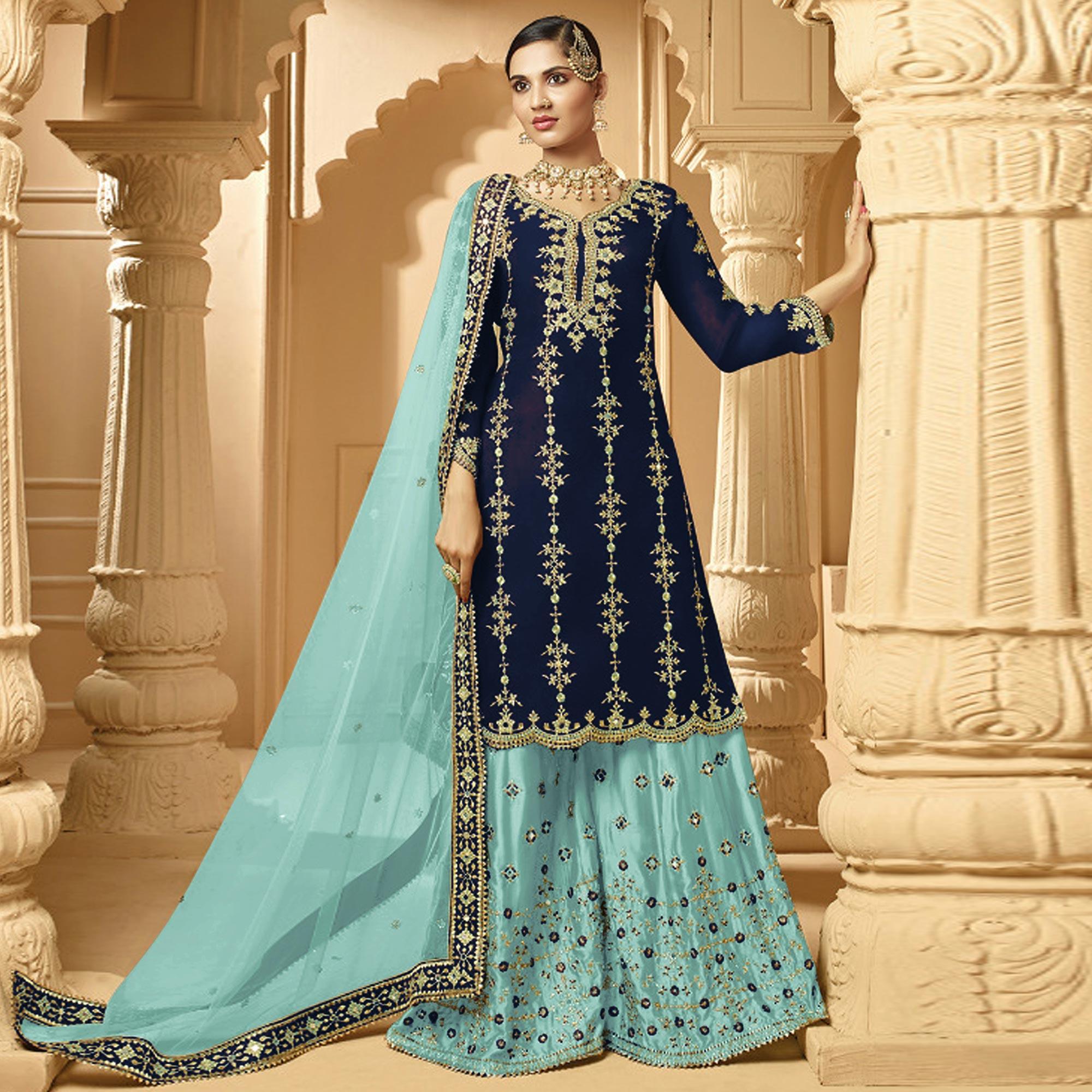 Innovative Navy Blue Colored Partywear Embroidered Faux Georgette Palazzo suit - Peachmode