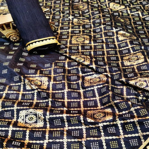 Intricate Black Colored Festive Wear Foil Printed Dola Silk Saree - Peachmode