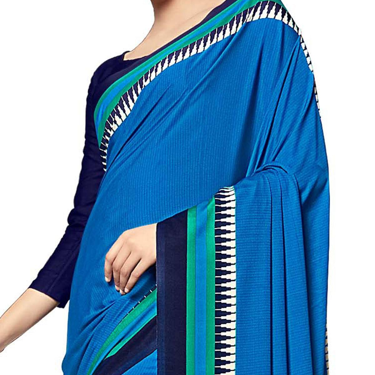 Intricate Blue Colored Casual Wear Printed Crepe Saree - Peachmode