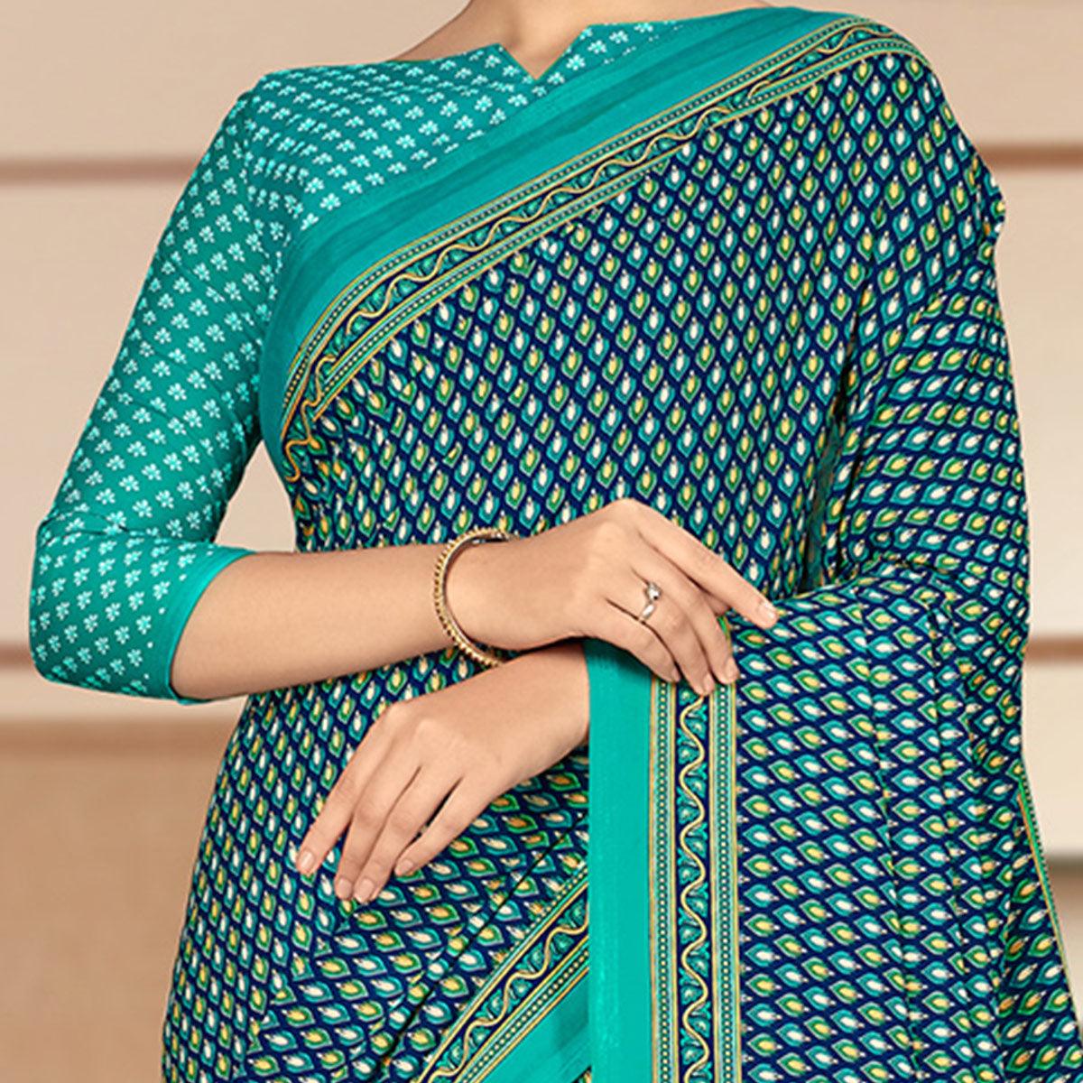 Intricate Blue Coloured Casual Wear Printed Crepe Saree - Peachmode