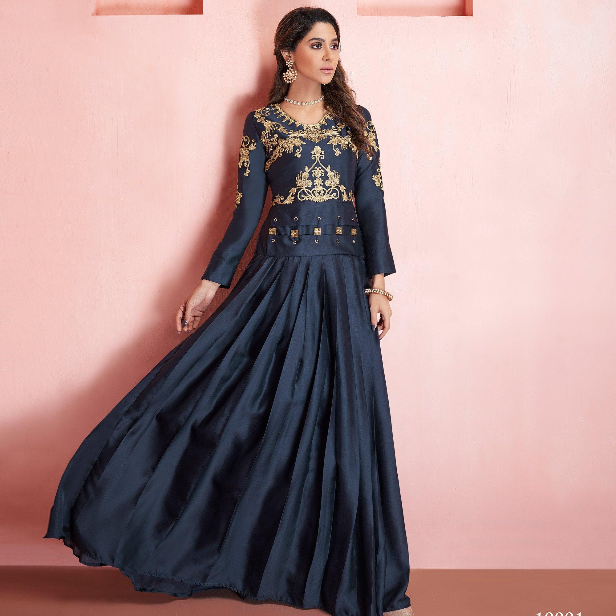 Intricate Greyish Black Colored Partywear Embroidered Tapeta Silk Gown - Peachmode