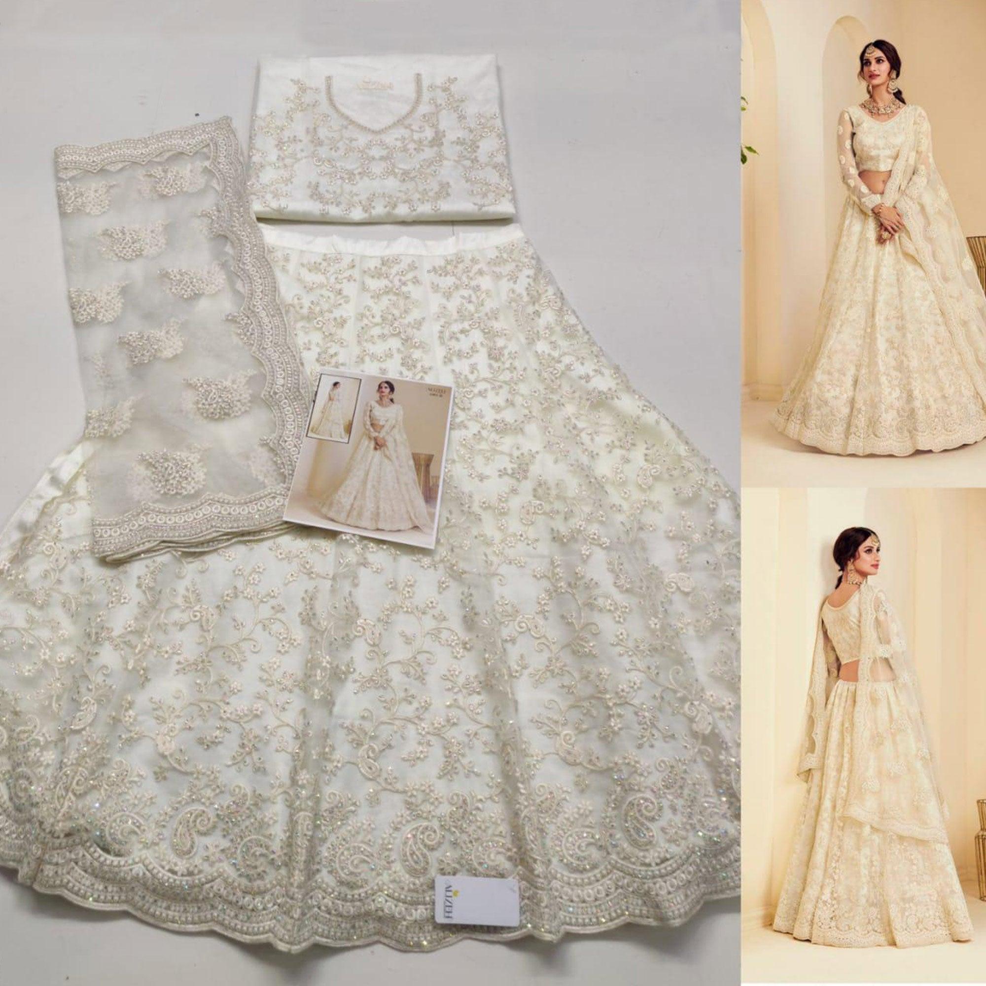 Intricate Off White Coloured Wedding Wear Cording Embroidered Net Lehenga Choli - Peachmode