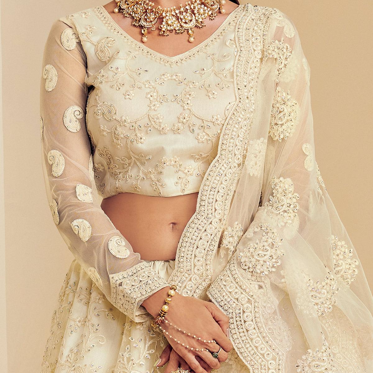 Intricate Off White Coloured Wedding Wear Cording Embroidered Net Lehenga Choli - Peachmode