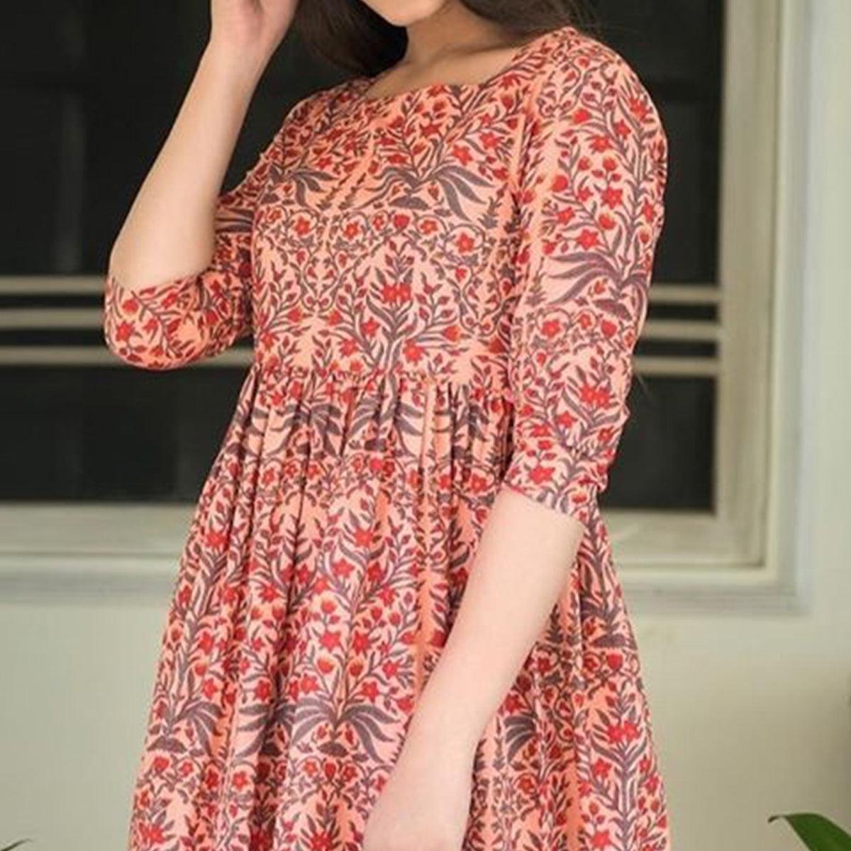 Intricate Peach Colored Casual Printed Muslin Blend Gown - Peachmode