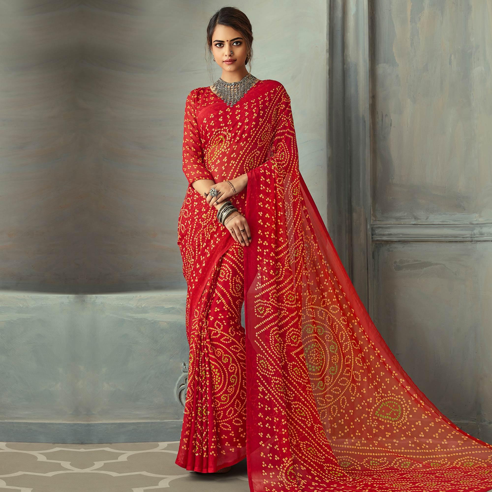 Intricate Red Colored Casual Wear Bandhani Printed Chiffon Saree - Peachmode