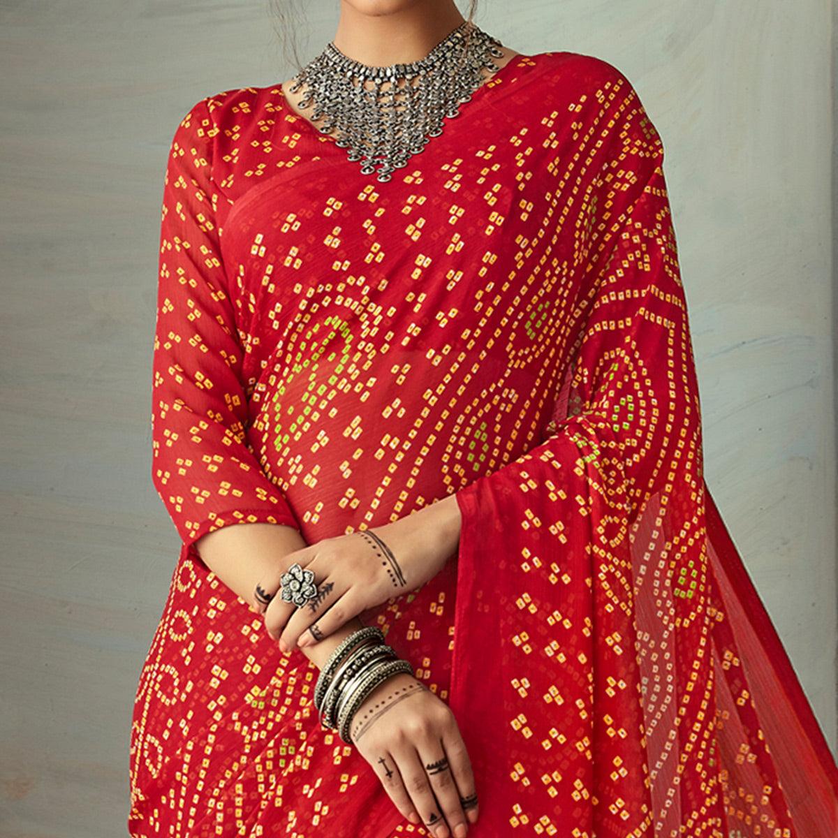 Intricate Red Colored Casual Wear Bandhani Printed Chiffon Saree - Peachmode