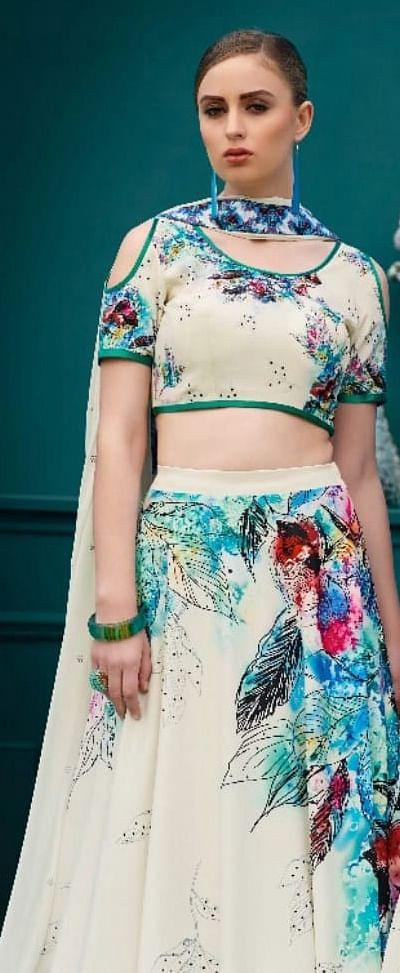 Invaluable Cream Colored Designer Partywear Digital Printed Silk Lehenga Choli - Peachmode