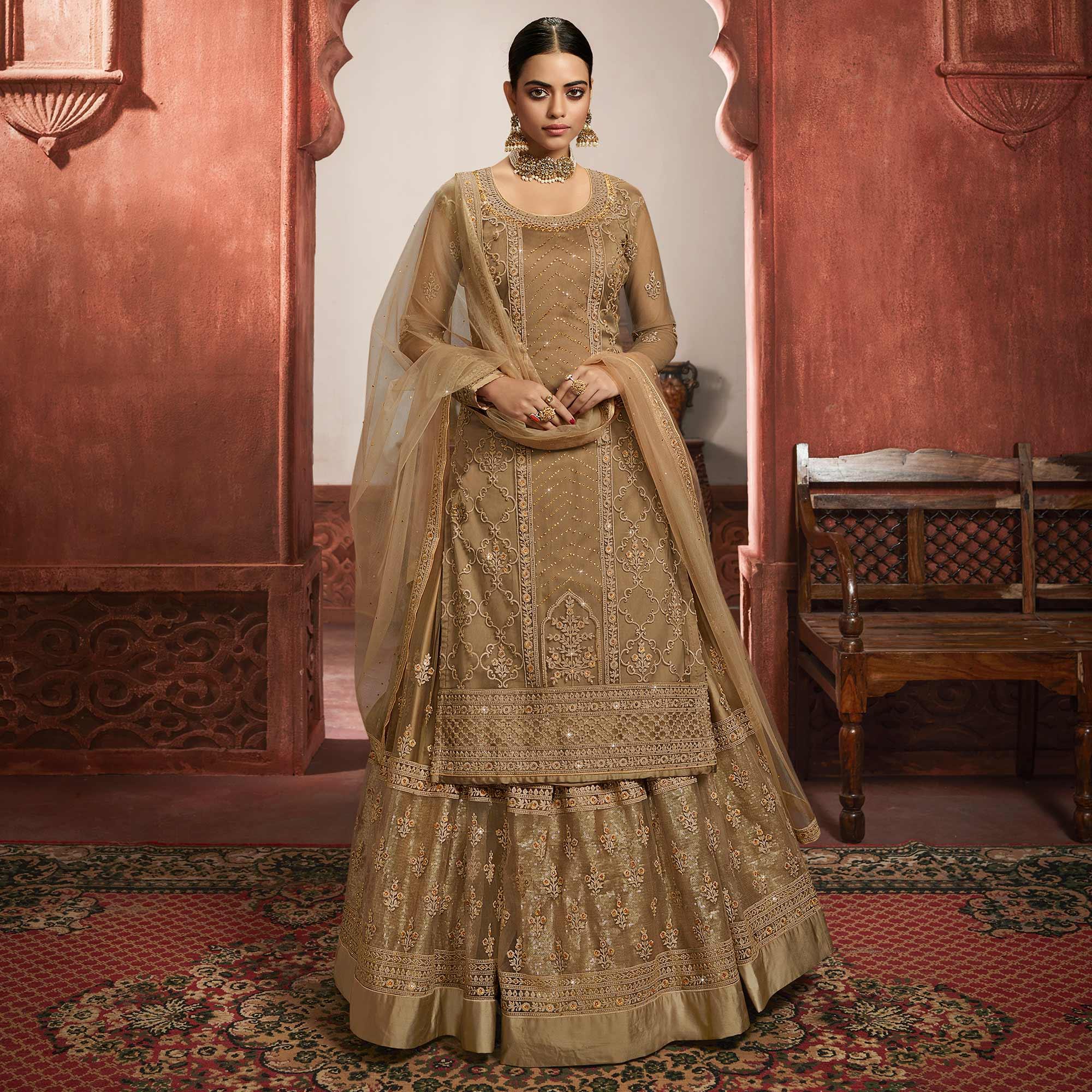 Jazzy Beige Coloured Partywear Embroidered Super Net Sharara Style Salwar Suit - Peachmode