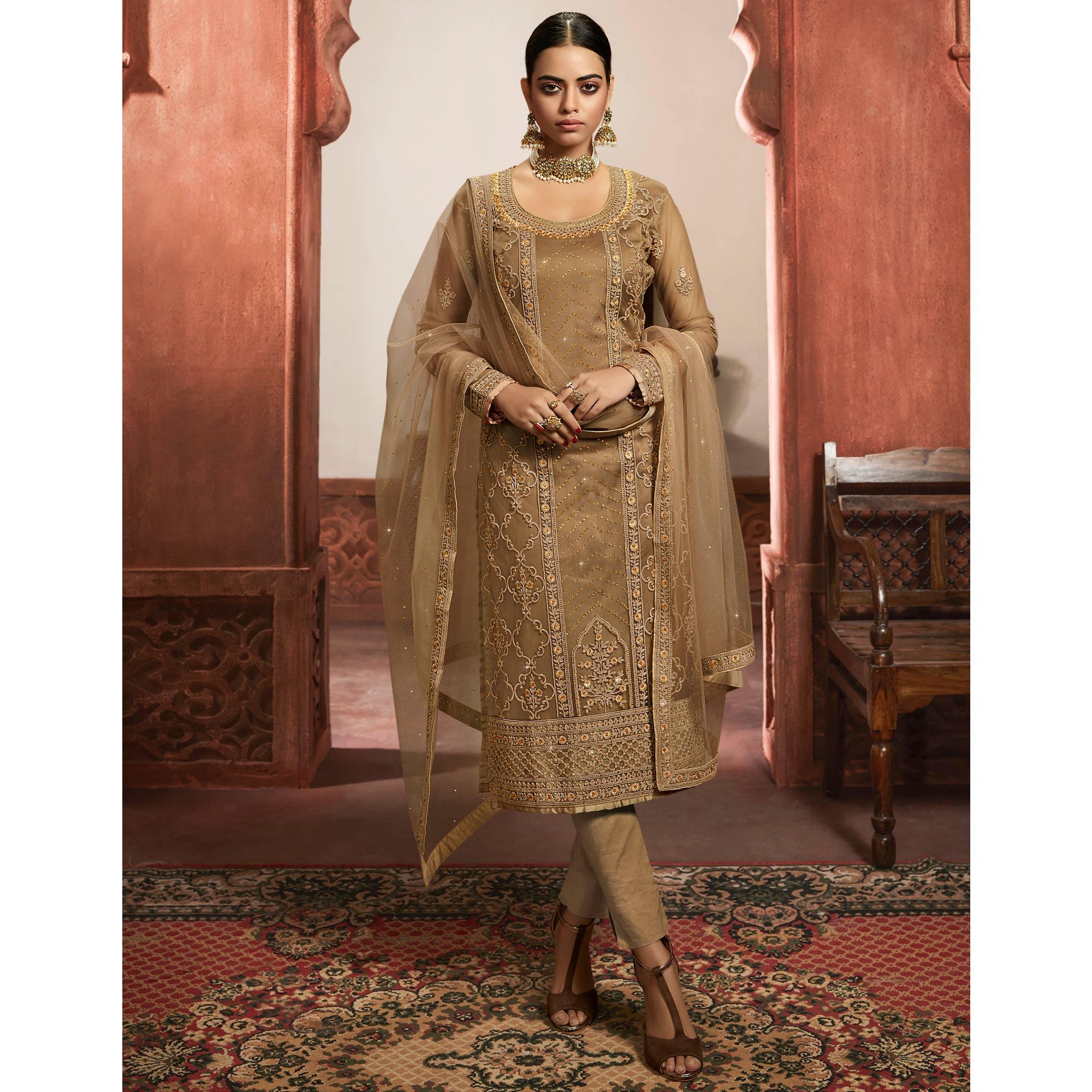 Jazzy Beige Coloured Partywear Embroidered Super Net Sharara Style Salwar Suit - Peachmode