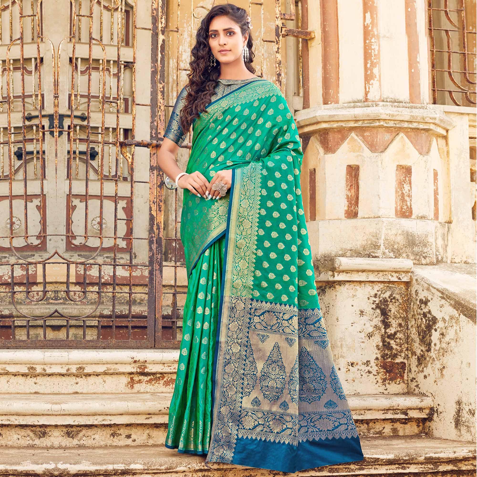 Jazzy Turqouise Coloured Designer Partywear Weaving Silk Saree - Peachmode