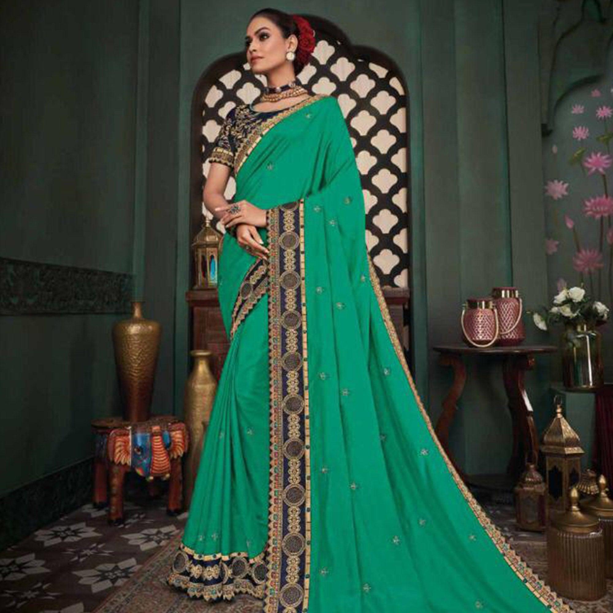 Jazzy Turquoise Green Colored Festive Wear Embroidered Heavy Border Silk Saree - Peachmode