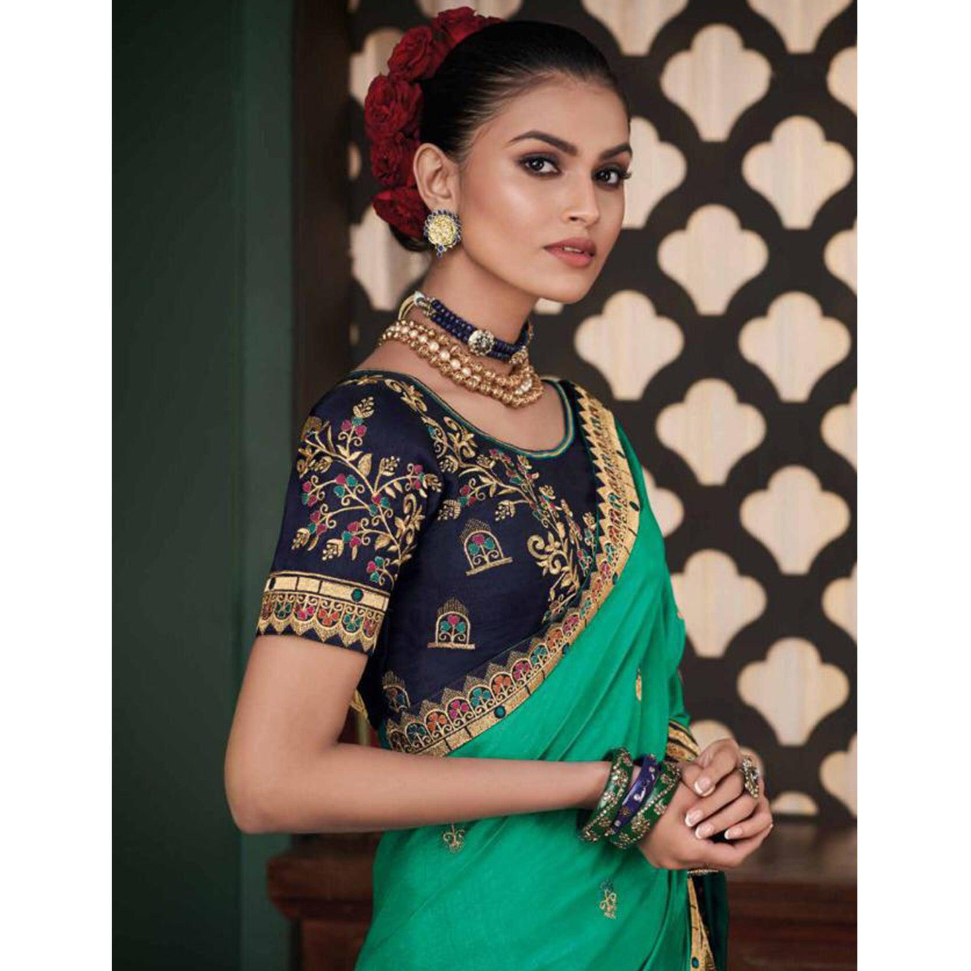 Jazzy Turquoise Green Colored Festive Wear Embroidered Heavy Border Silk Saree - Peachmode