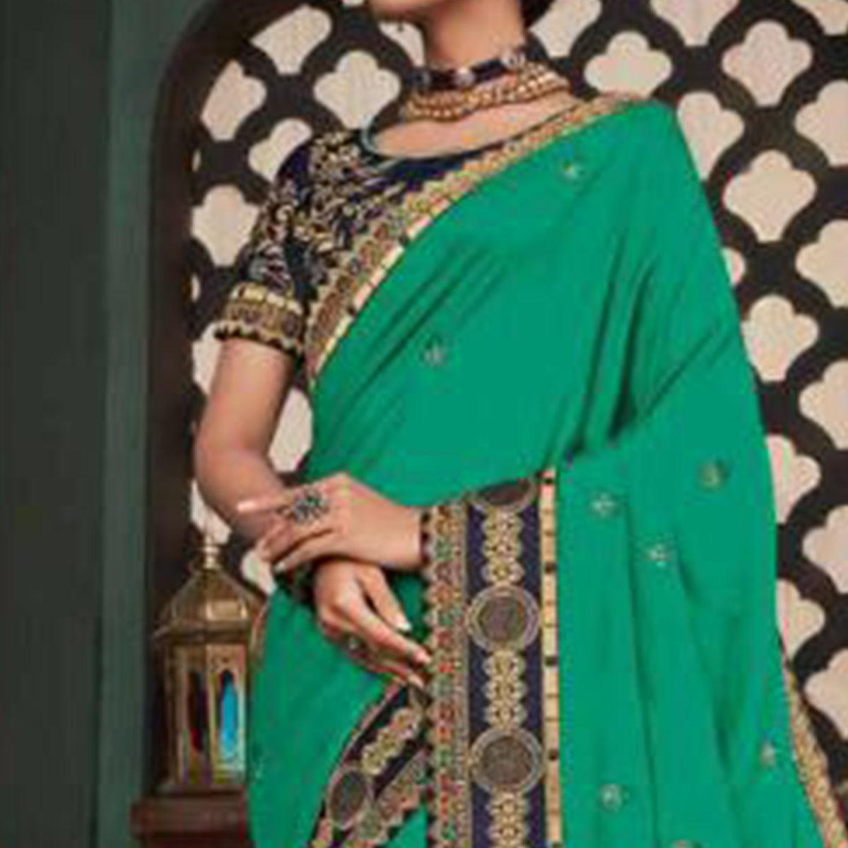 Jazzy Turquoise Green Colored Festive Wear Embroidered Heavy Border Silk Saree - Peachmode