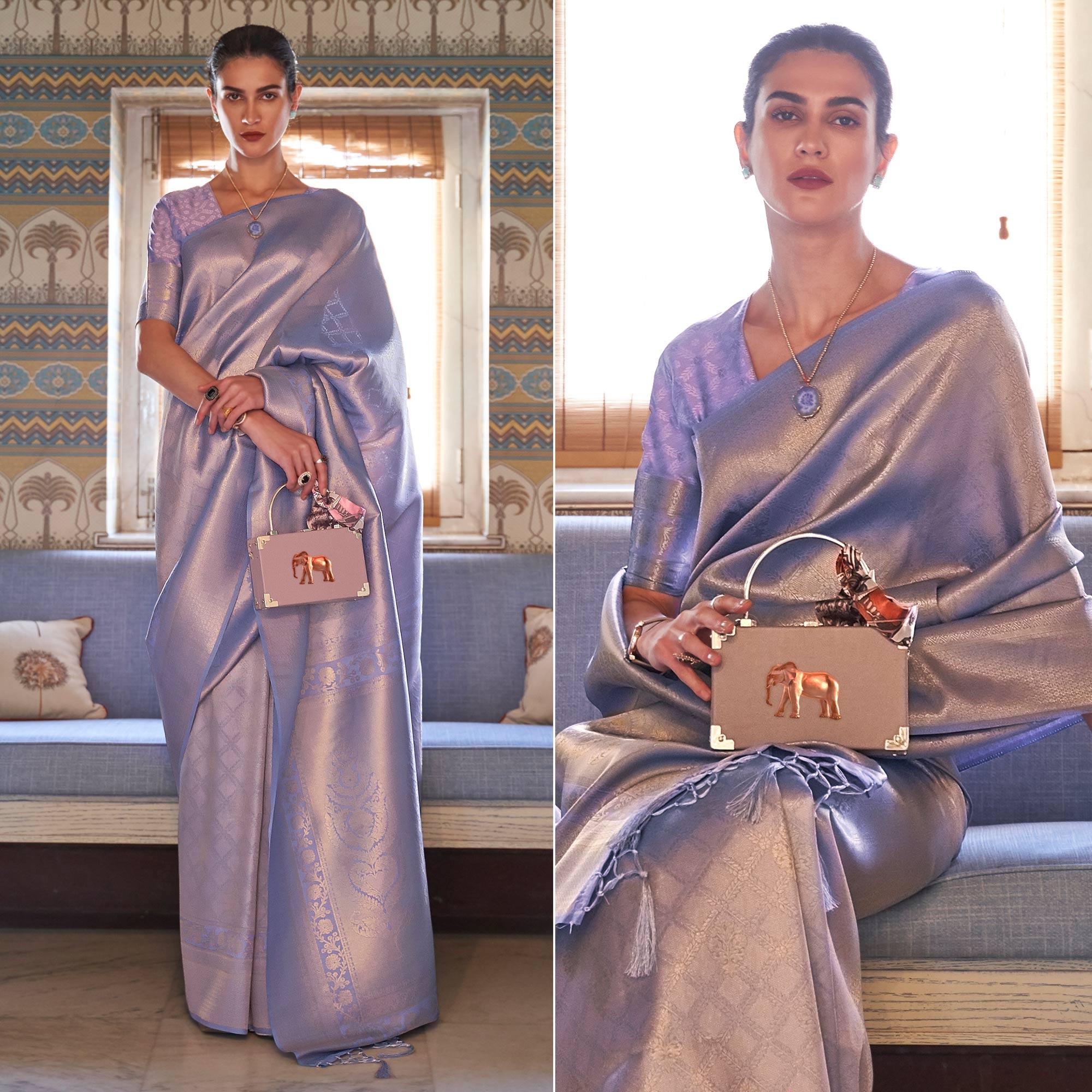 Lavender Woven Art Silk Saree With Tassels - Peachmode