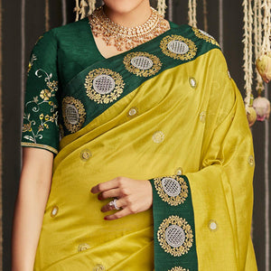 Lemon Green Woven With Embellished Art Silk Saree With Tassels - Peachmode