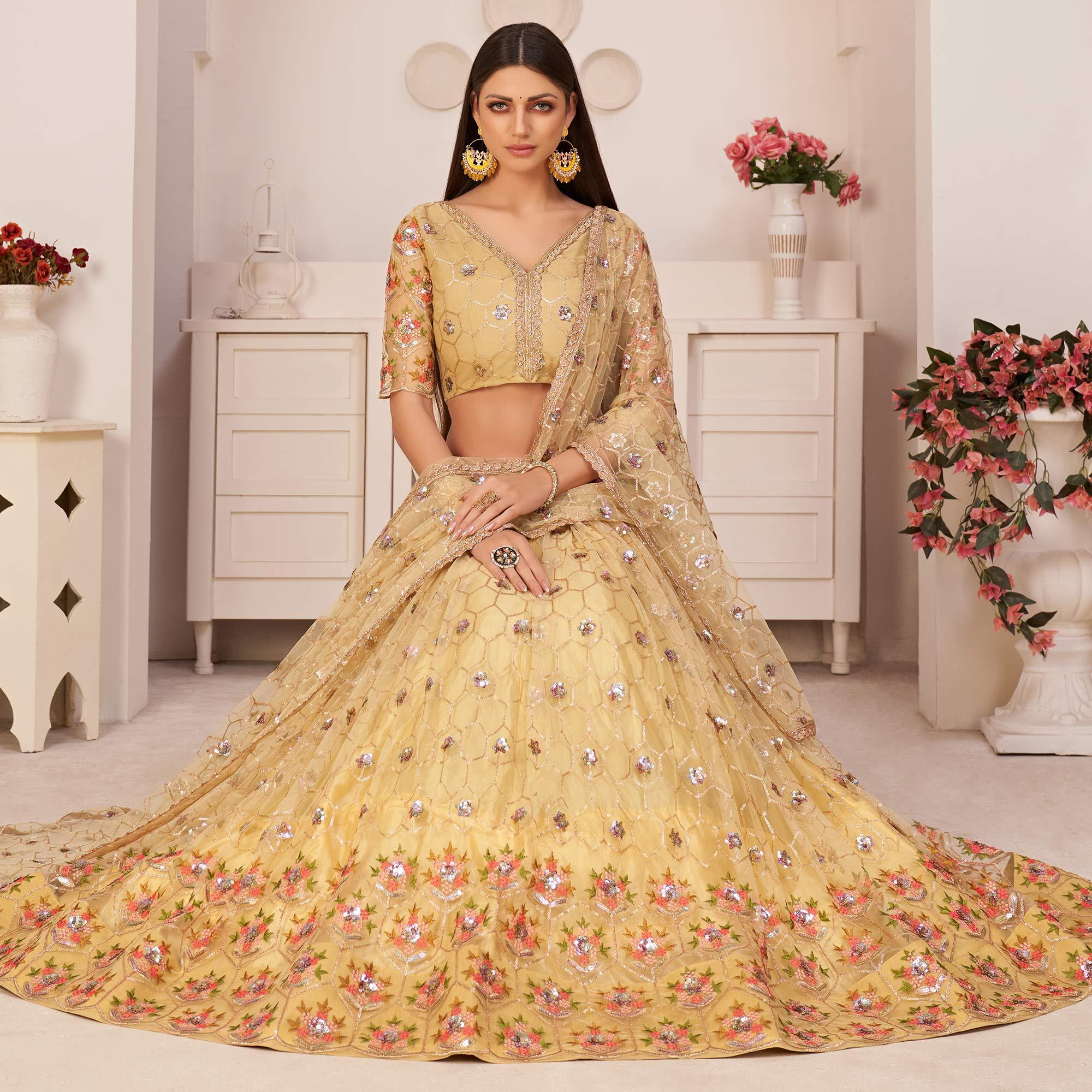 Lemon Yellow Party Wear Embroidered Netted Lehenga Choli - Peachmode