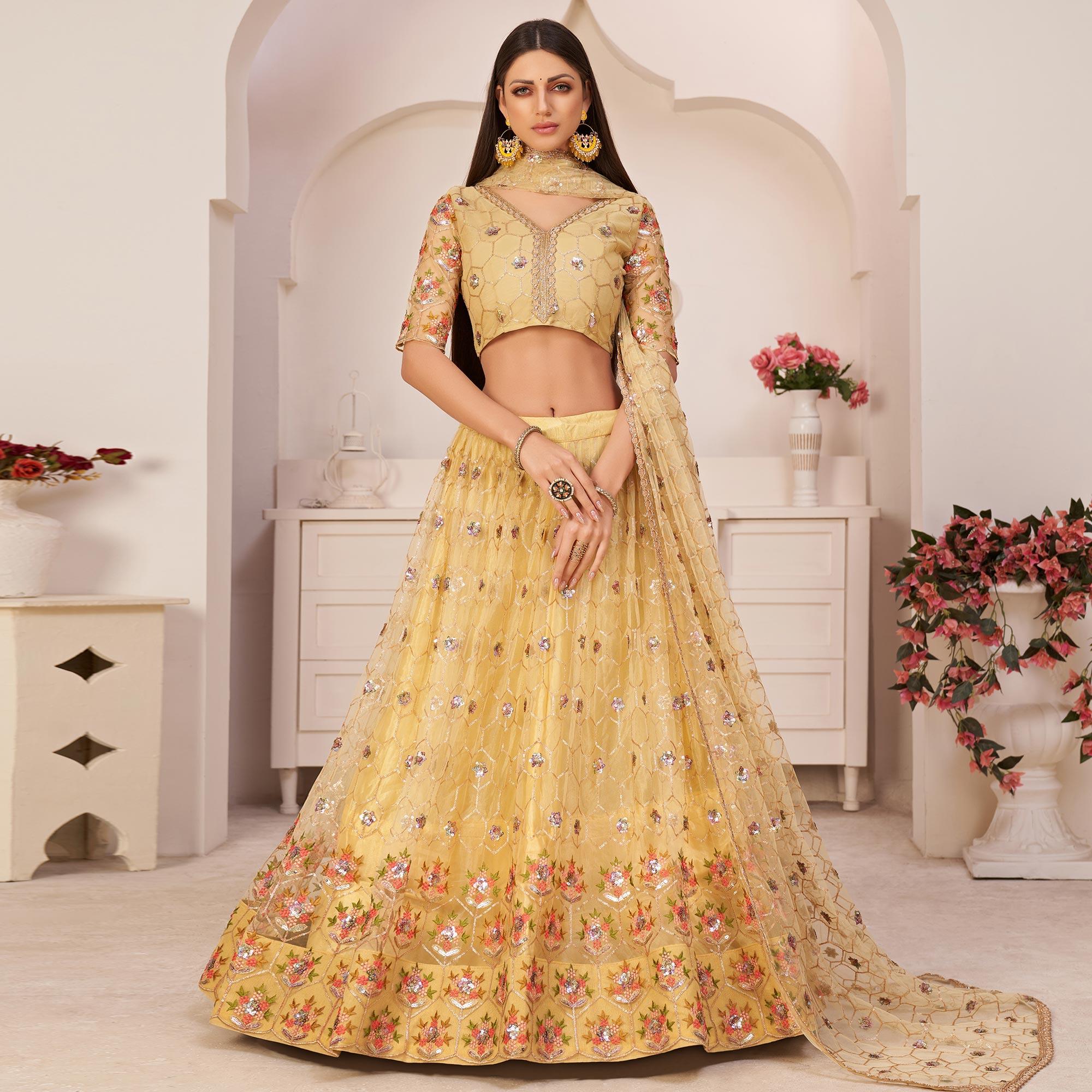 Lemon Yellow Party Wear Embroidered Netted Lehenga Choli - Peachmode