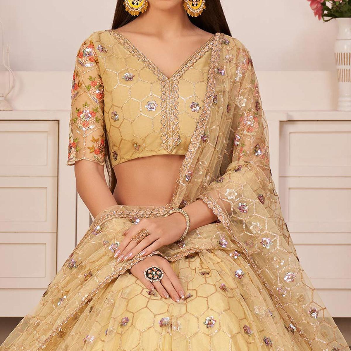 Lemon Yellow Party Wear Embroidered Netted Lehenga Choli - Peachmode
