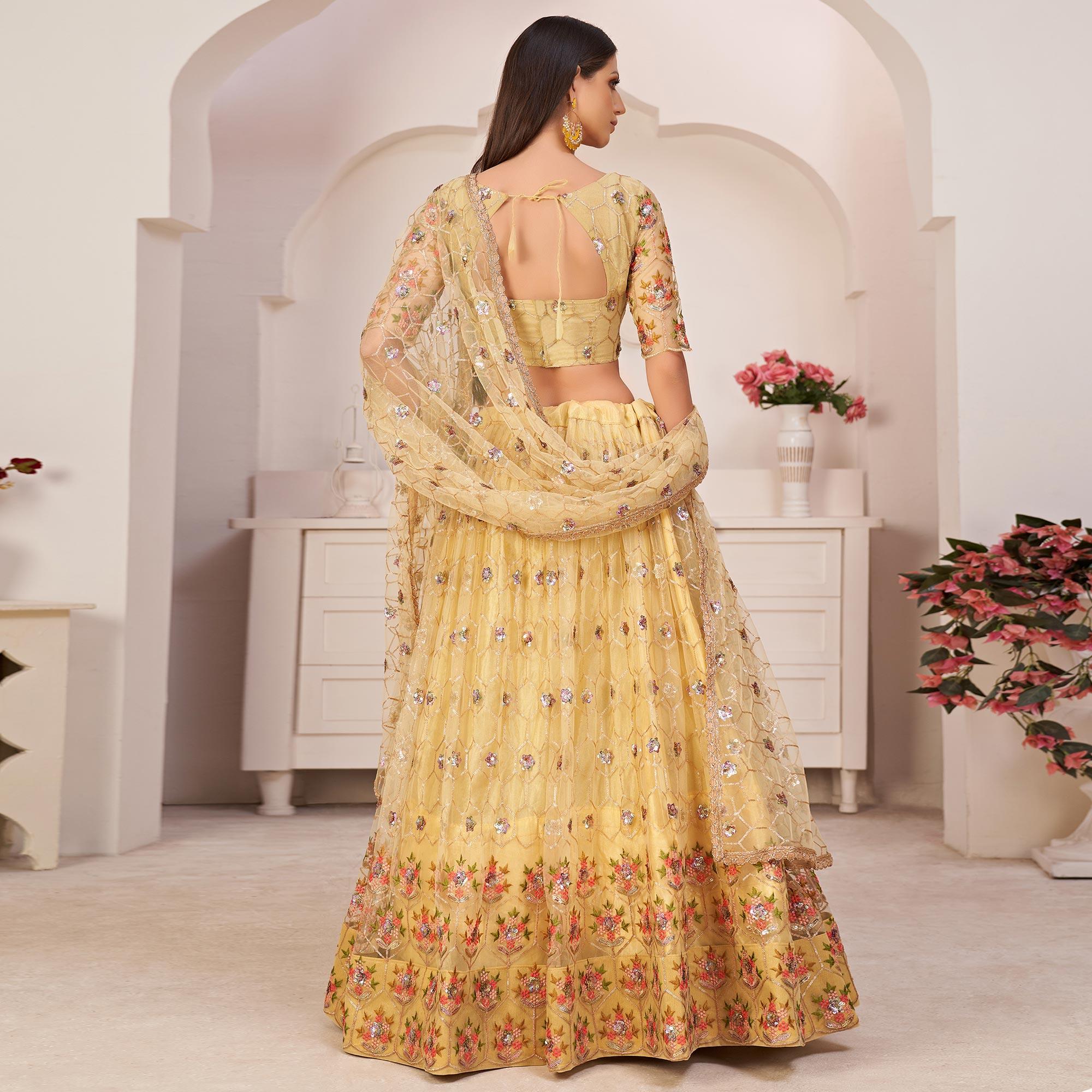 Lemon Yellow Party Wear Embroidered Netted Lehenga Choli - Peachmode
