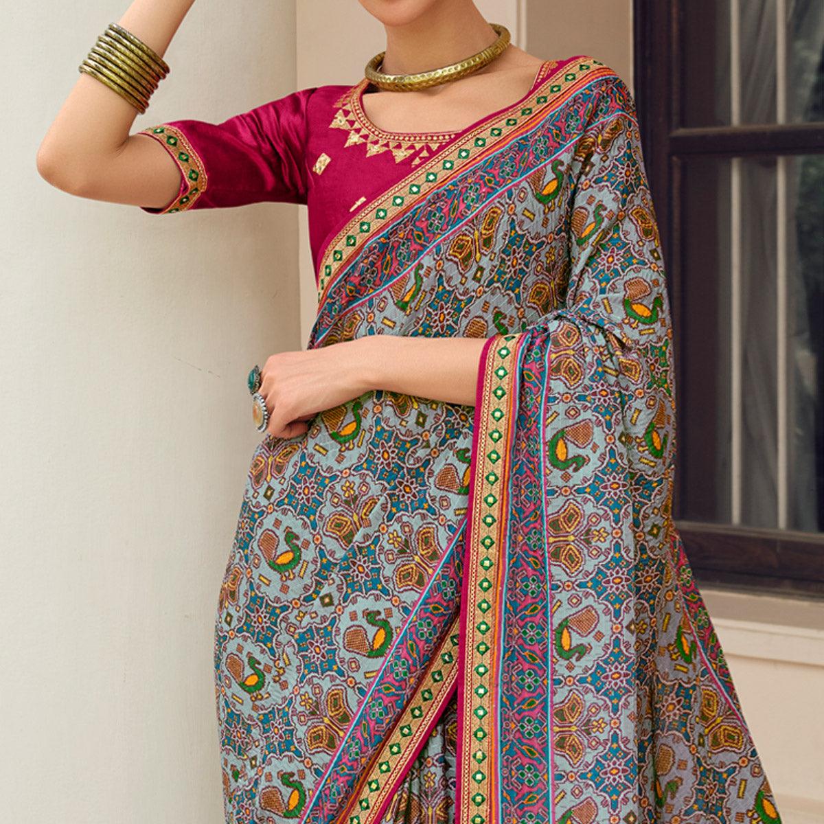 Light Blue Printed With Embellished Chiffon Saree With Tassels - Peachmode