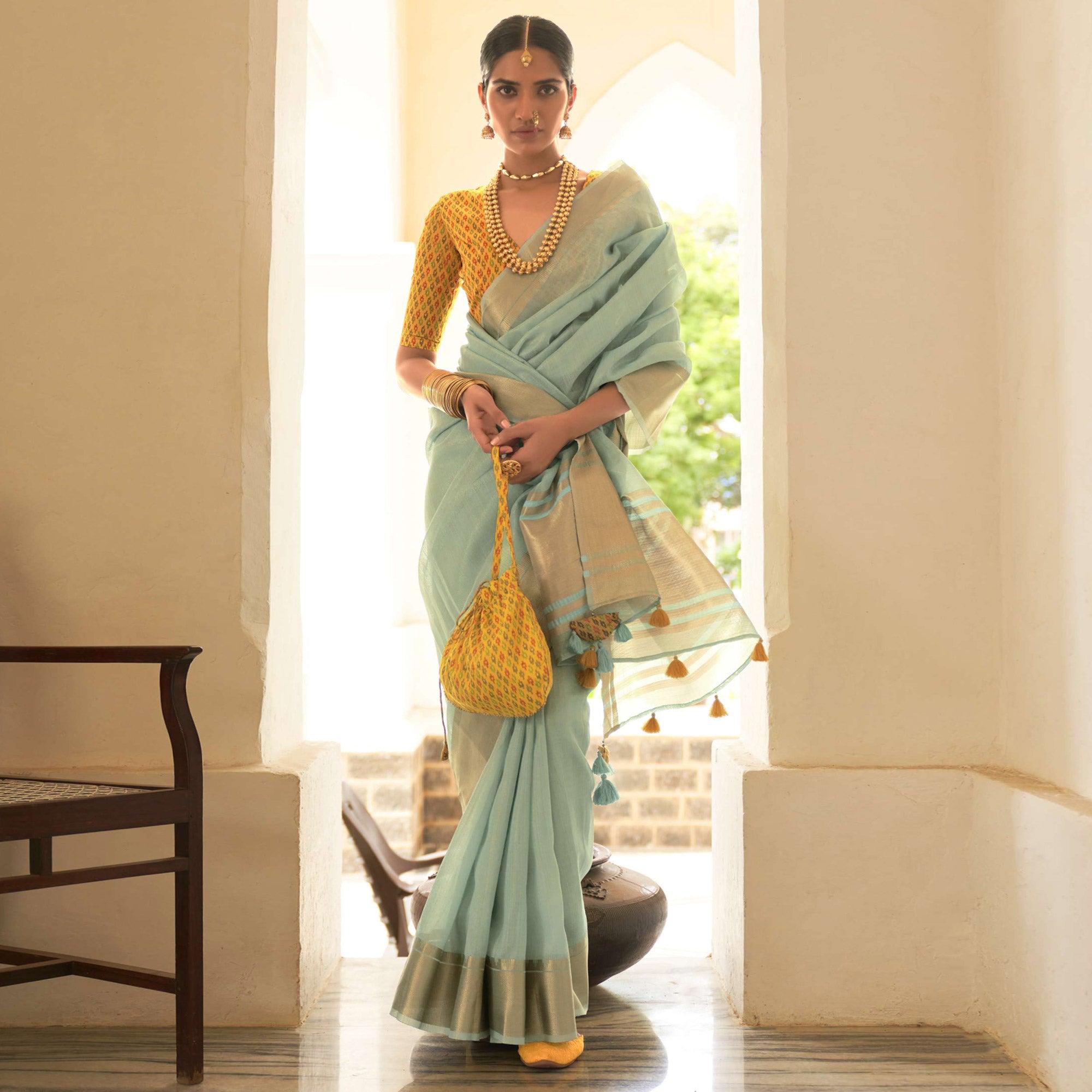 Light Blue Woven Organza Saree With Tassels - Peachmode