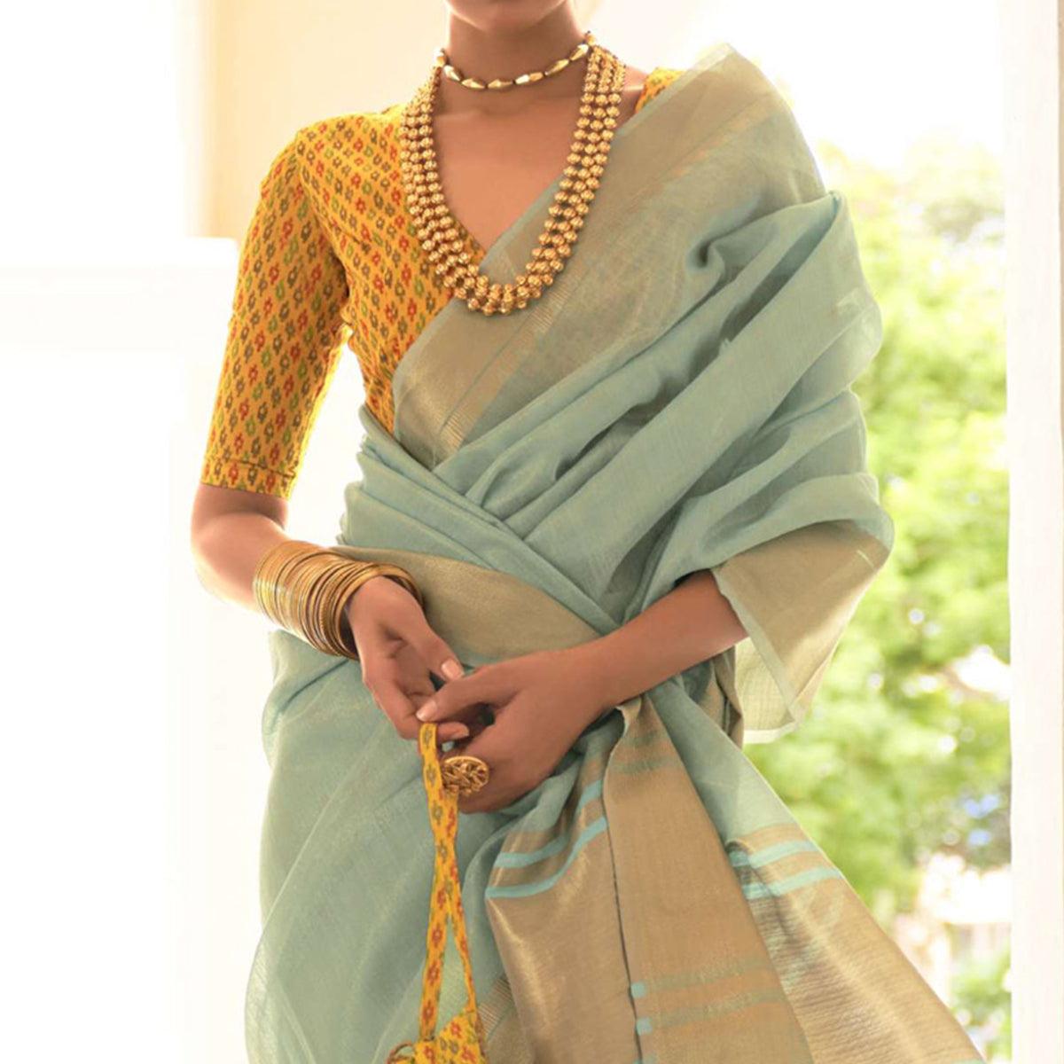 Light Blue Woven Organza Saree With Tassels - Peachmode