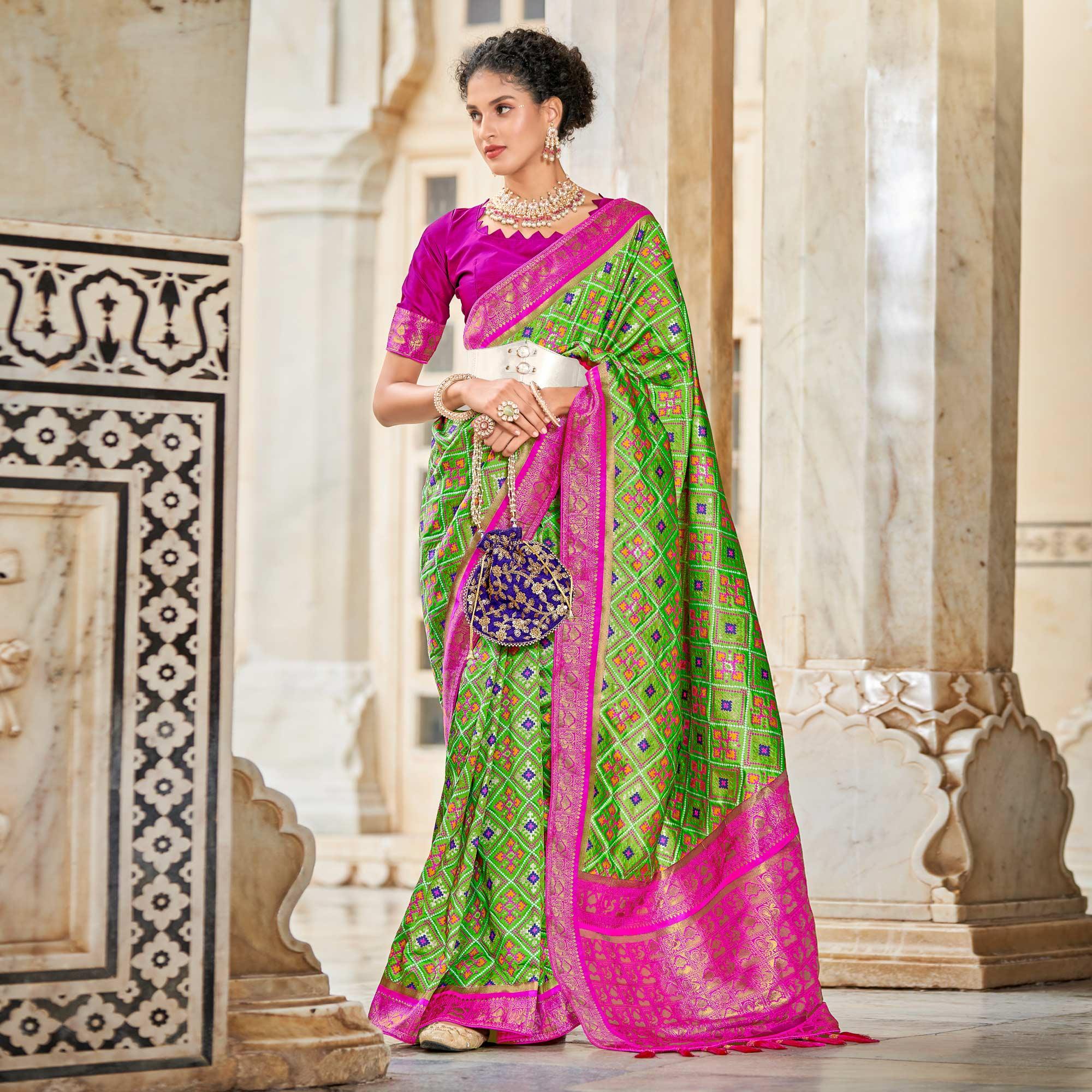 Light Green Woven Art Silk Patola Saree With Tassels - Peachmode