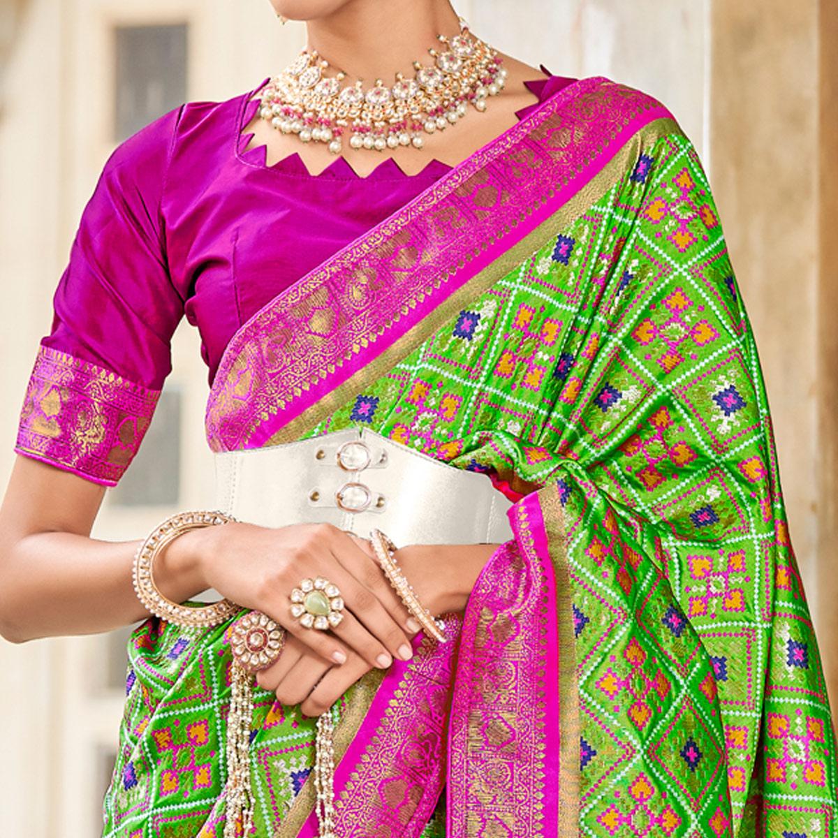 Light Green Woven Art Silk Patola Saree With Tassels - Peachmode