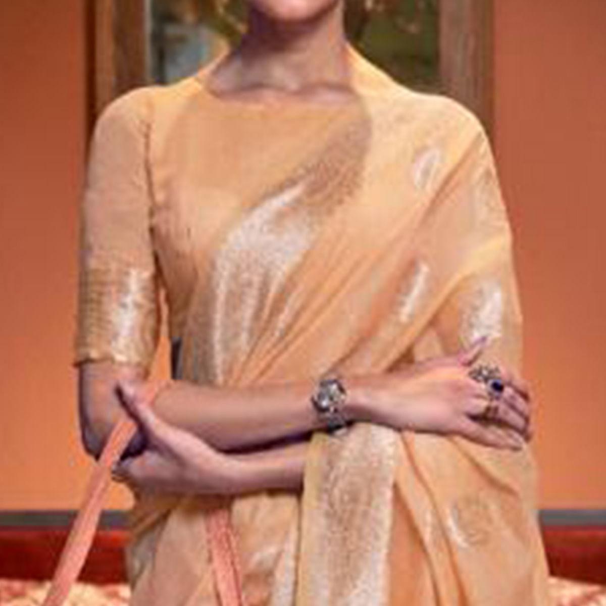 Light Orange Woven Linen Saree With Tassels - Peachmode