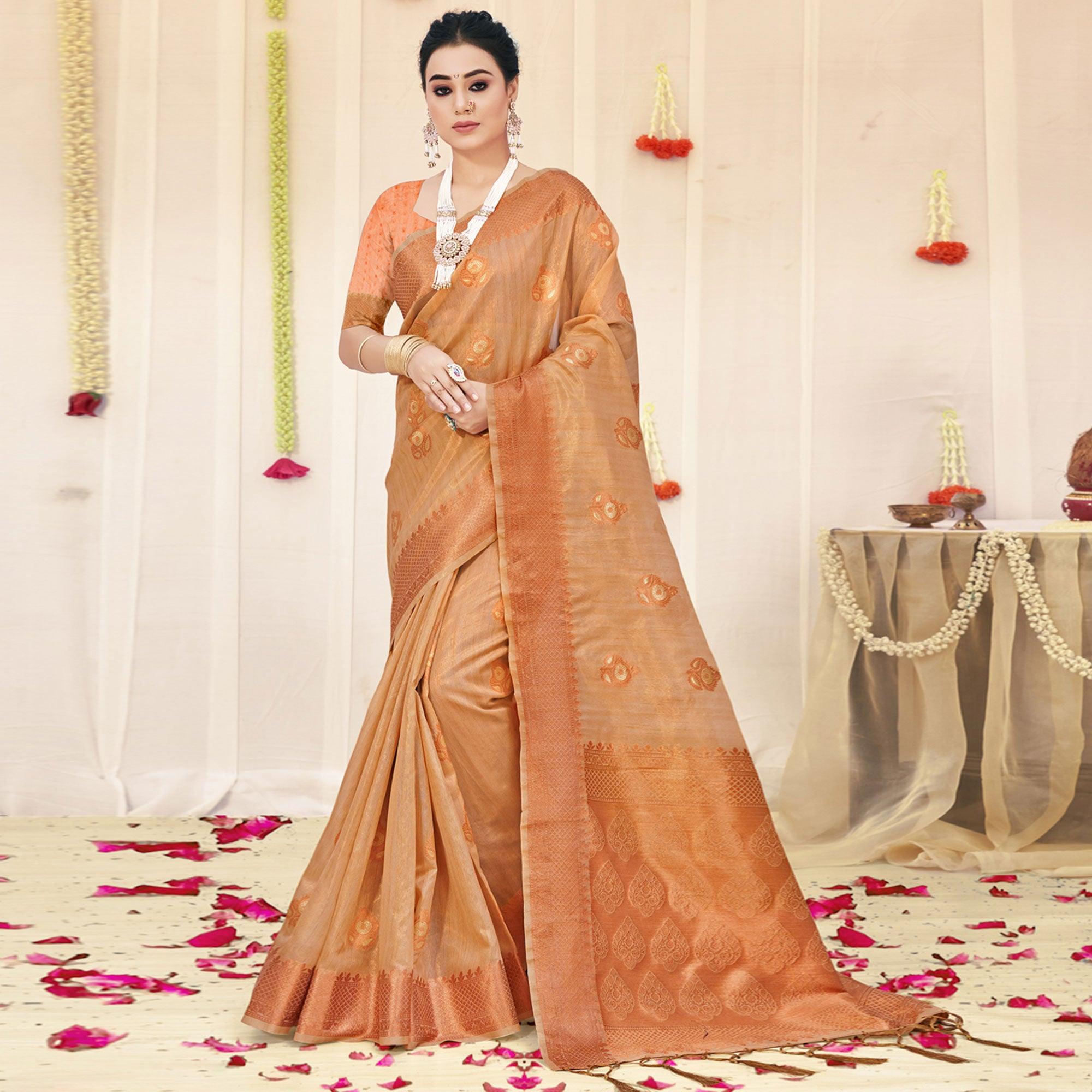 Light Peach Woven Organza Saree With Tassels - Peachmode