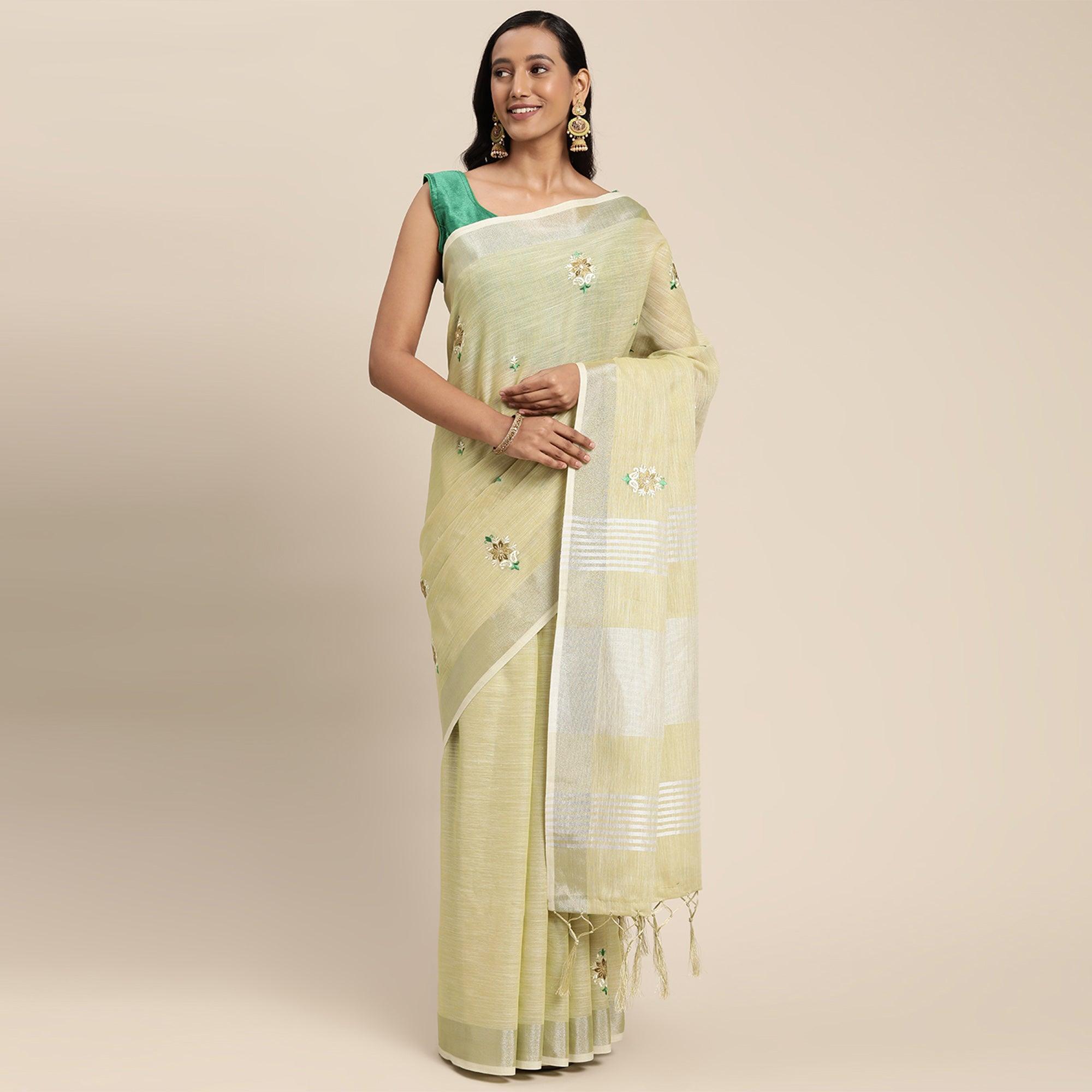 Light Yellow Embroidered Linen Saree With Tassels - Peachmode