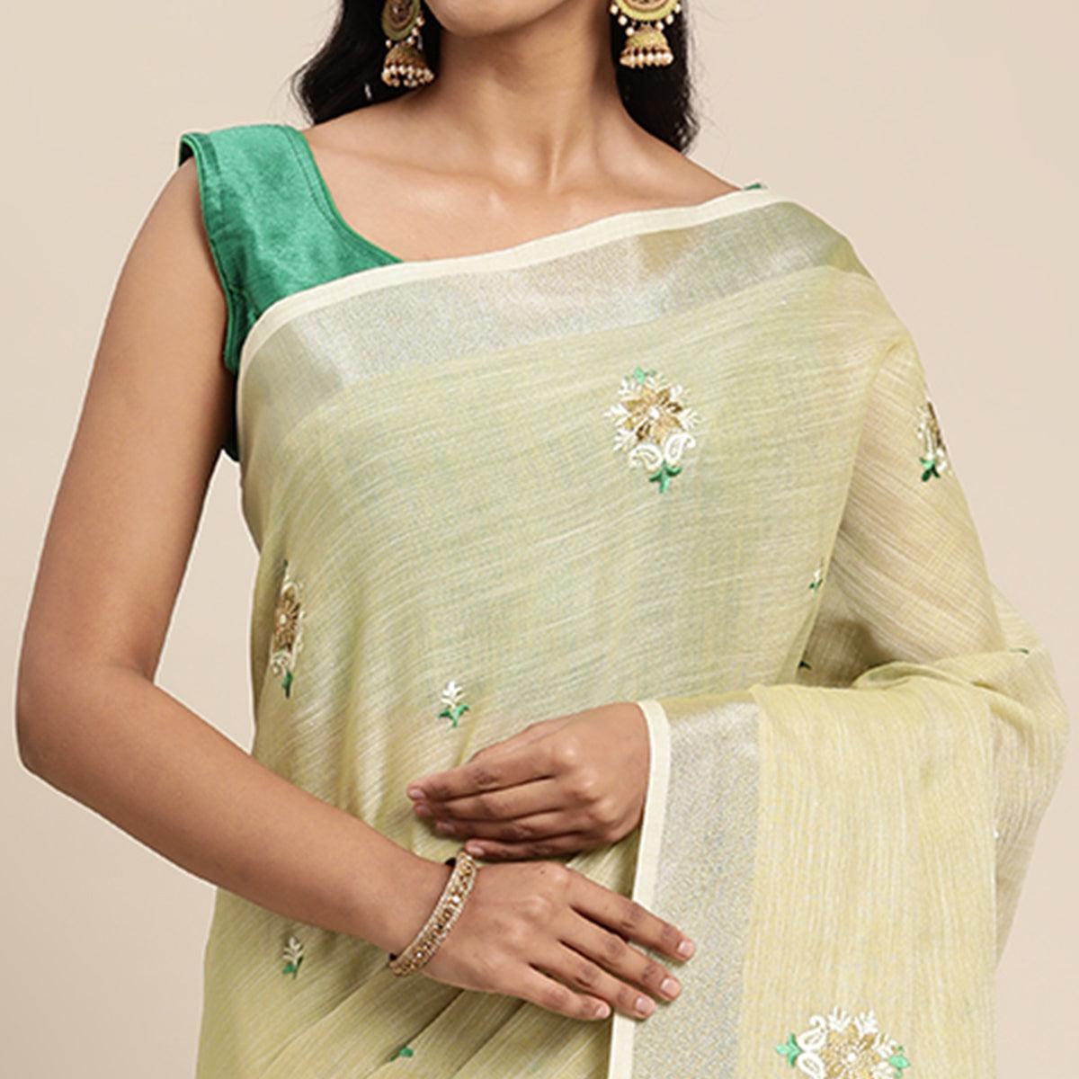 Light Yellow Embroidered Linen Saree With Tassels - Peachmode