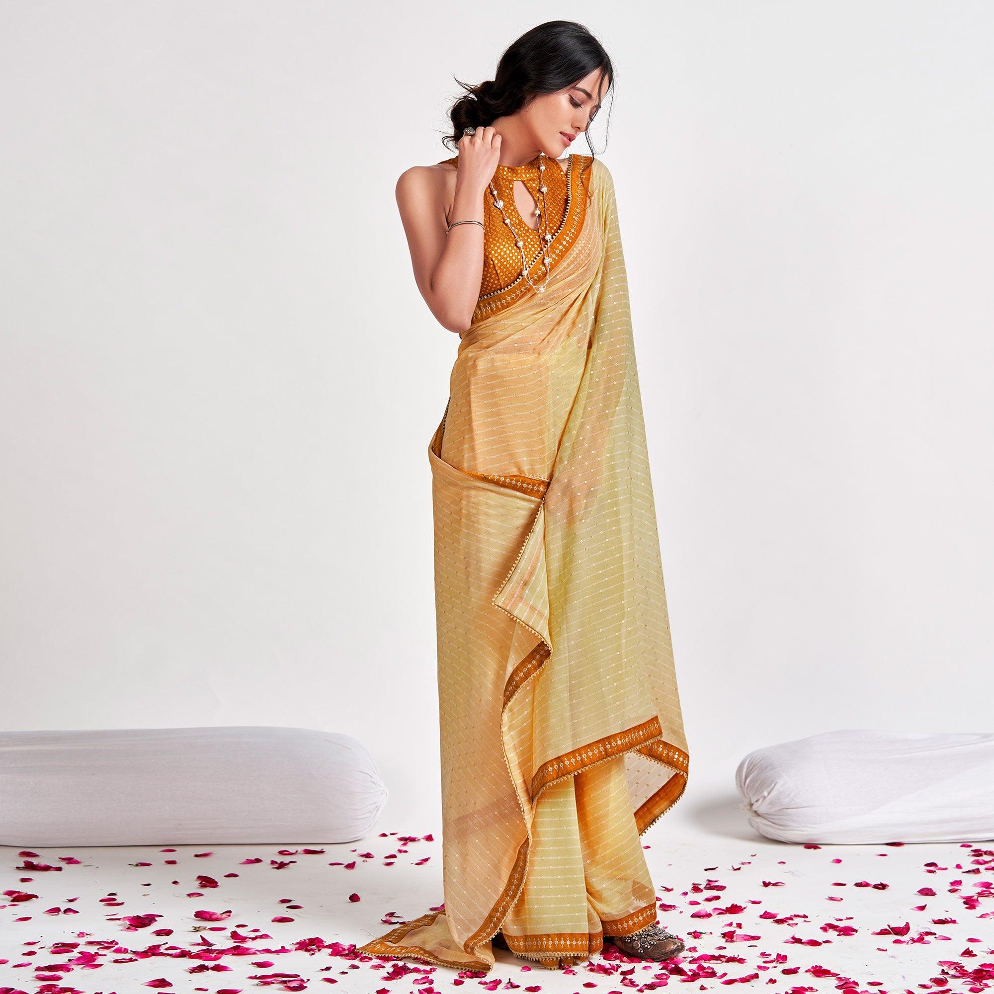 Light Yellow Partywear Sequence Foil Printed Georgette Saree - Peachmode