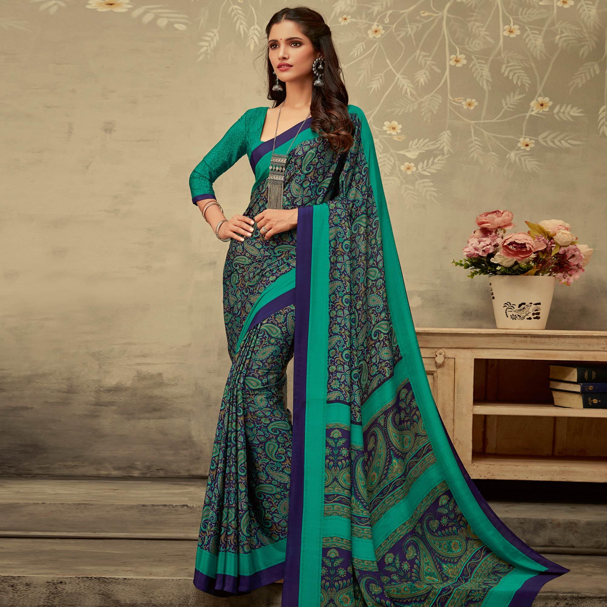 Lovely Blue Colored Partywear Printed Crepe Saree - Peachmode