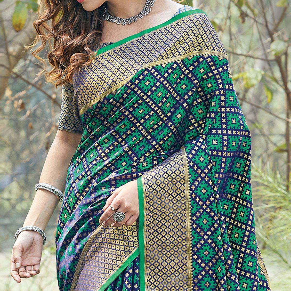 Lovely Green Colored Festive Wear Patan Patola Silk Saree - Peachmode
