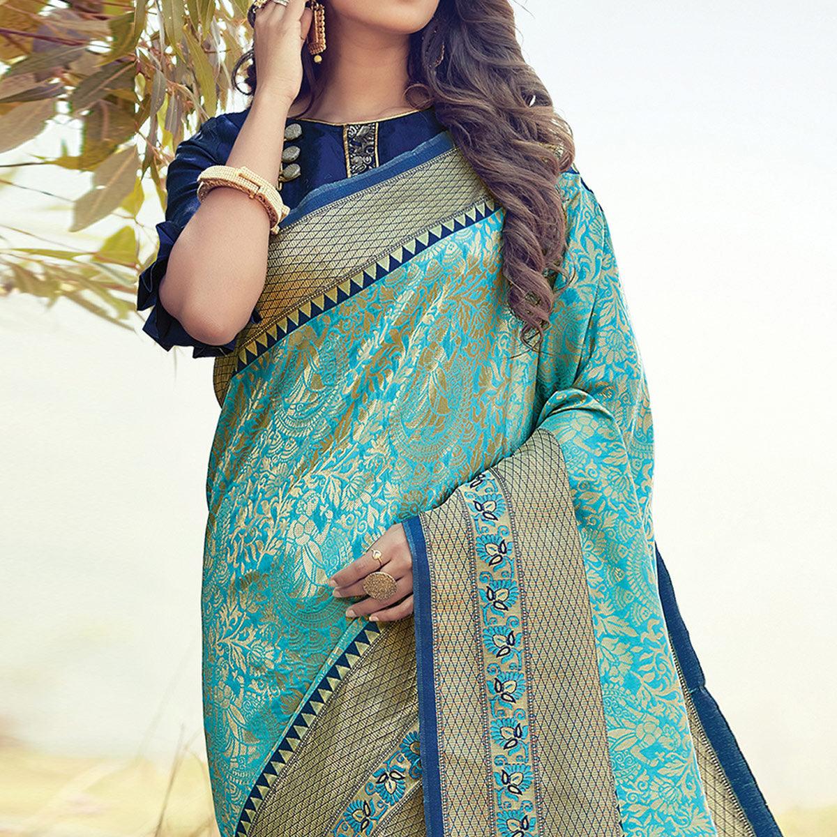 Lovely Turquoise Blue Colored Festive Wear Woven Silk Saree - Peachmode