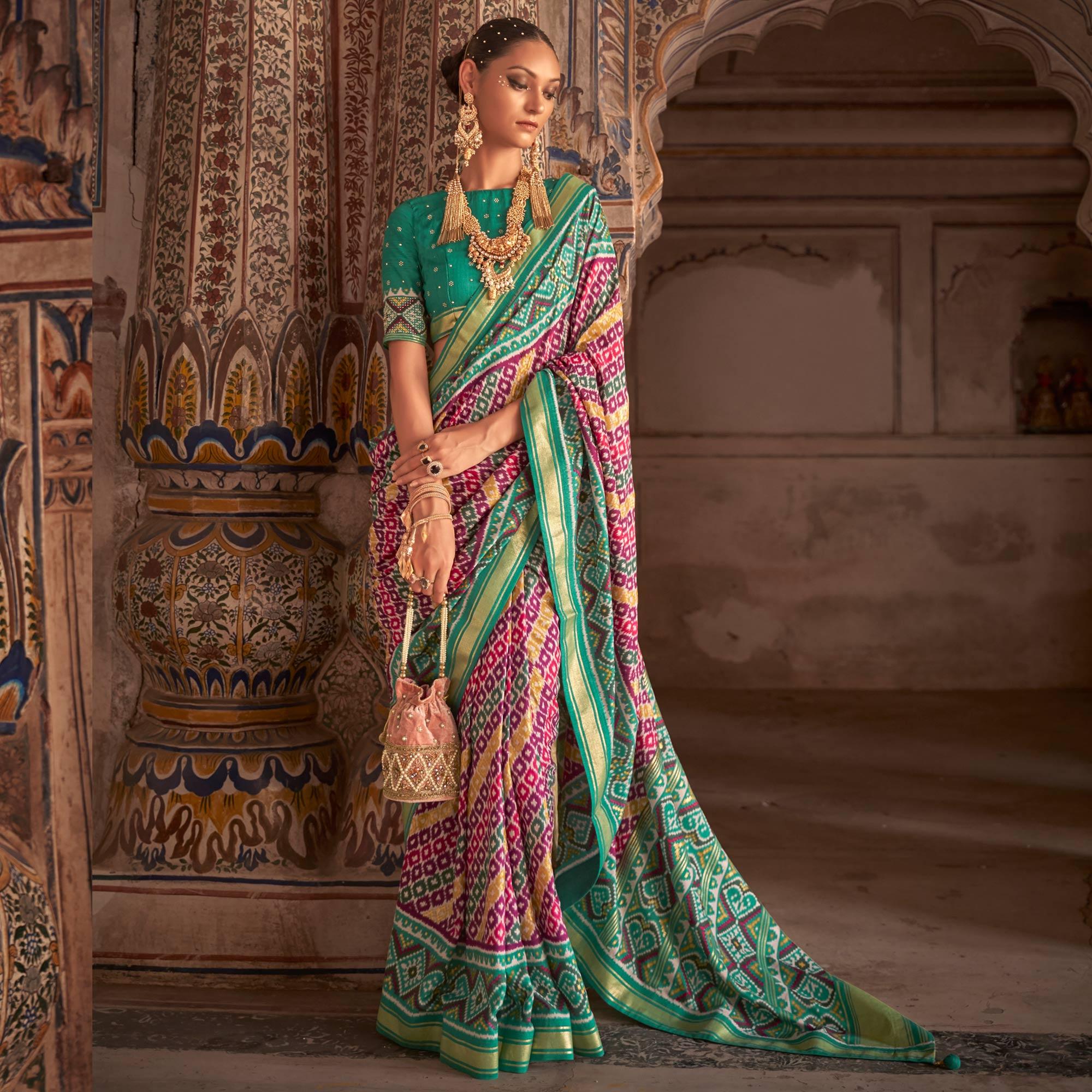 Magenta Patola Printed Art Silk Saree - Peachmode