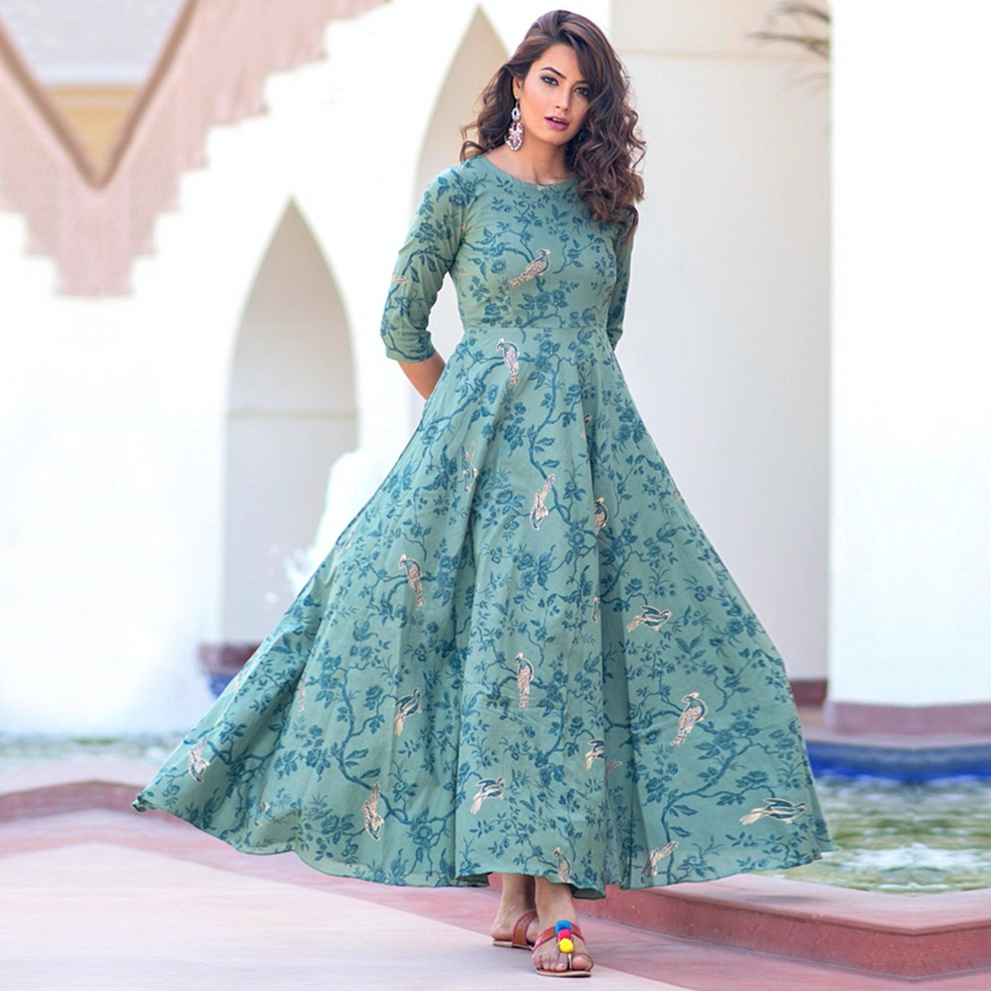 Magnetic Light Aqua Colored Partywear Printed Muslin Blend Long Kurti - Peachmode