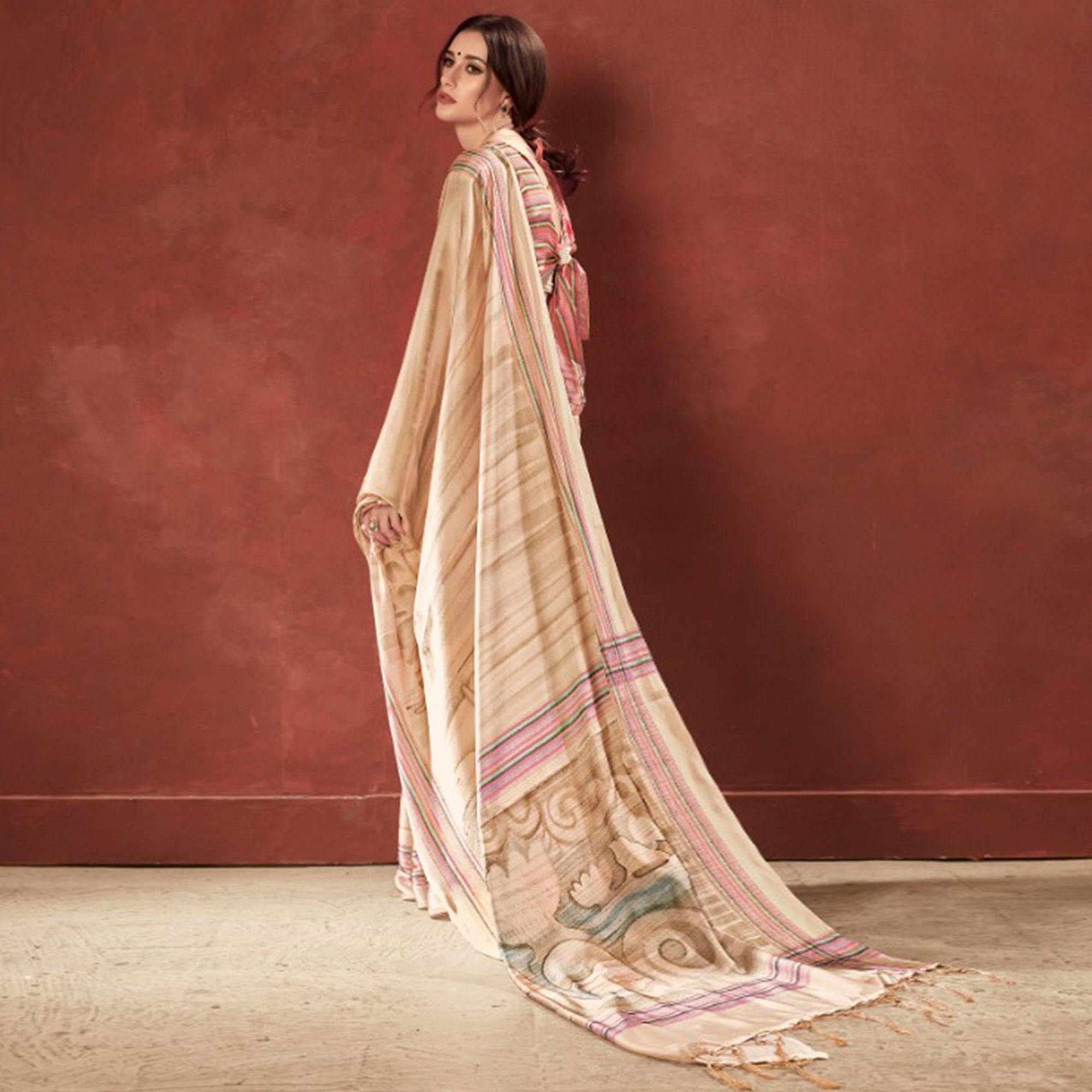 Majesty Cream Colored Casual Wear Printed Satin Crepe Saree With Tassels - Peachmode