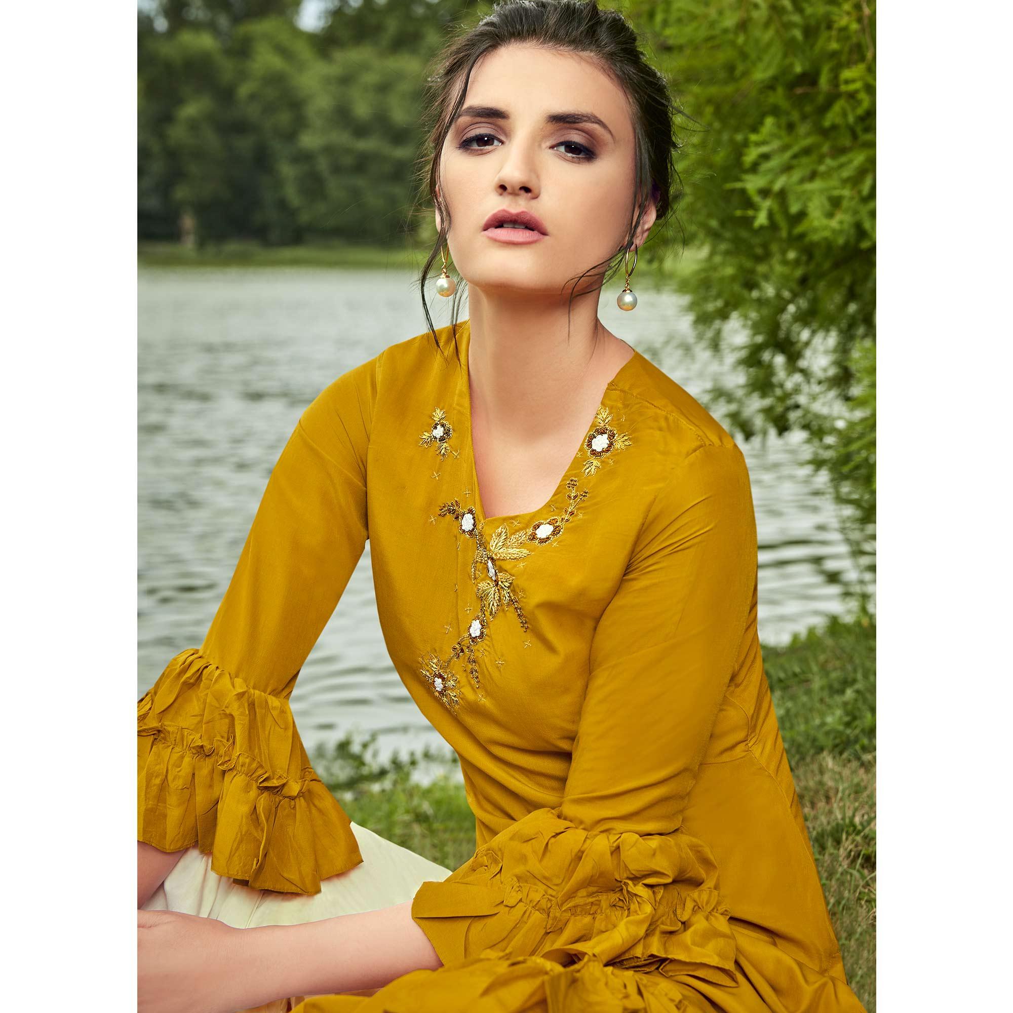 Majesty Mustard Yellow Colored Partywear Hand Embroidered Muslin Silk Kurti-Palazzo Set - Peachmode