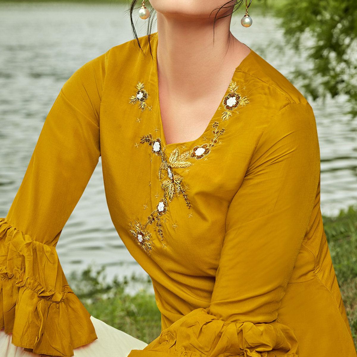 Majesty Mustard Yellow Colored Partywear Hand Embroidered Muslin Silk Kurti-Palazzo Set - Peachmode