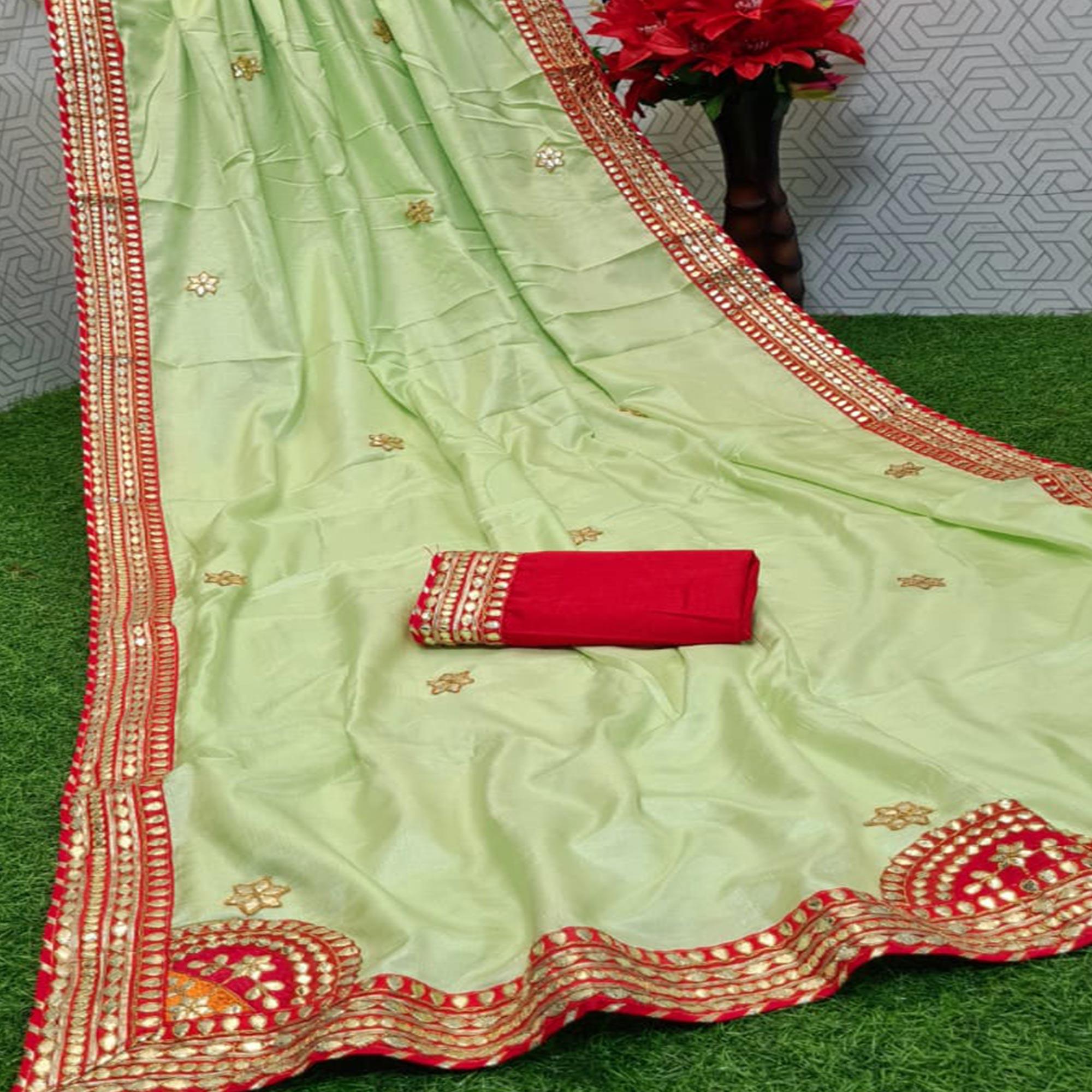 Majesty Pista Green Coloured Casual Wear Printed Dola Silk Saree - Peachmode