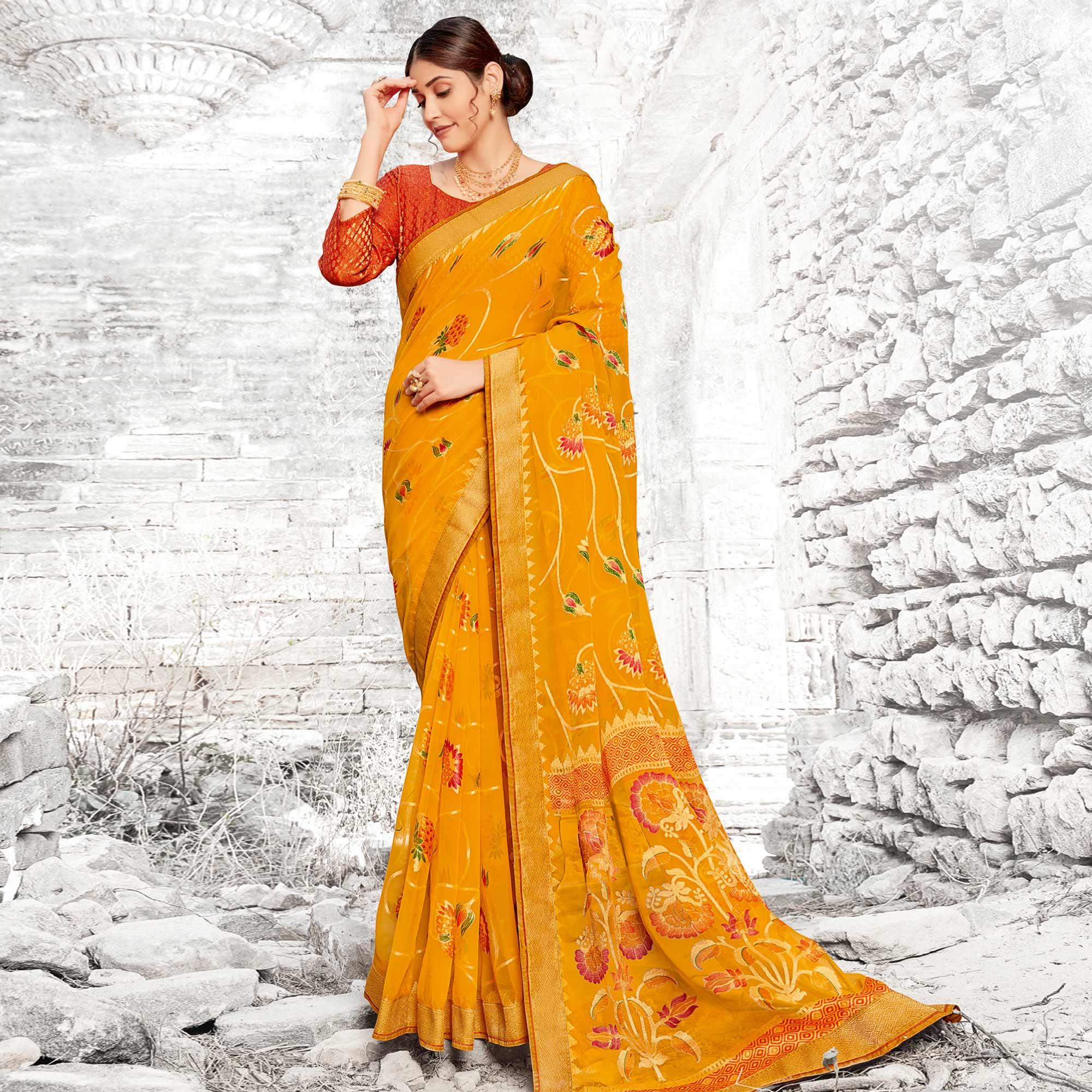 Majesty Yellow Coloured Partywear Printed Brasso Saree - Peachmode