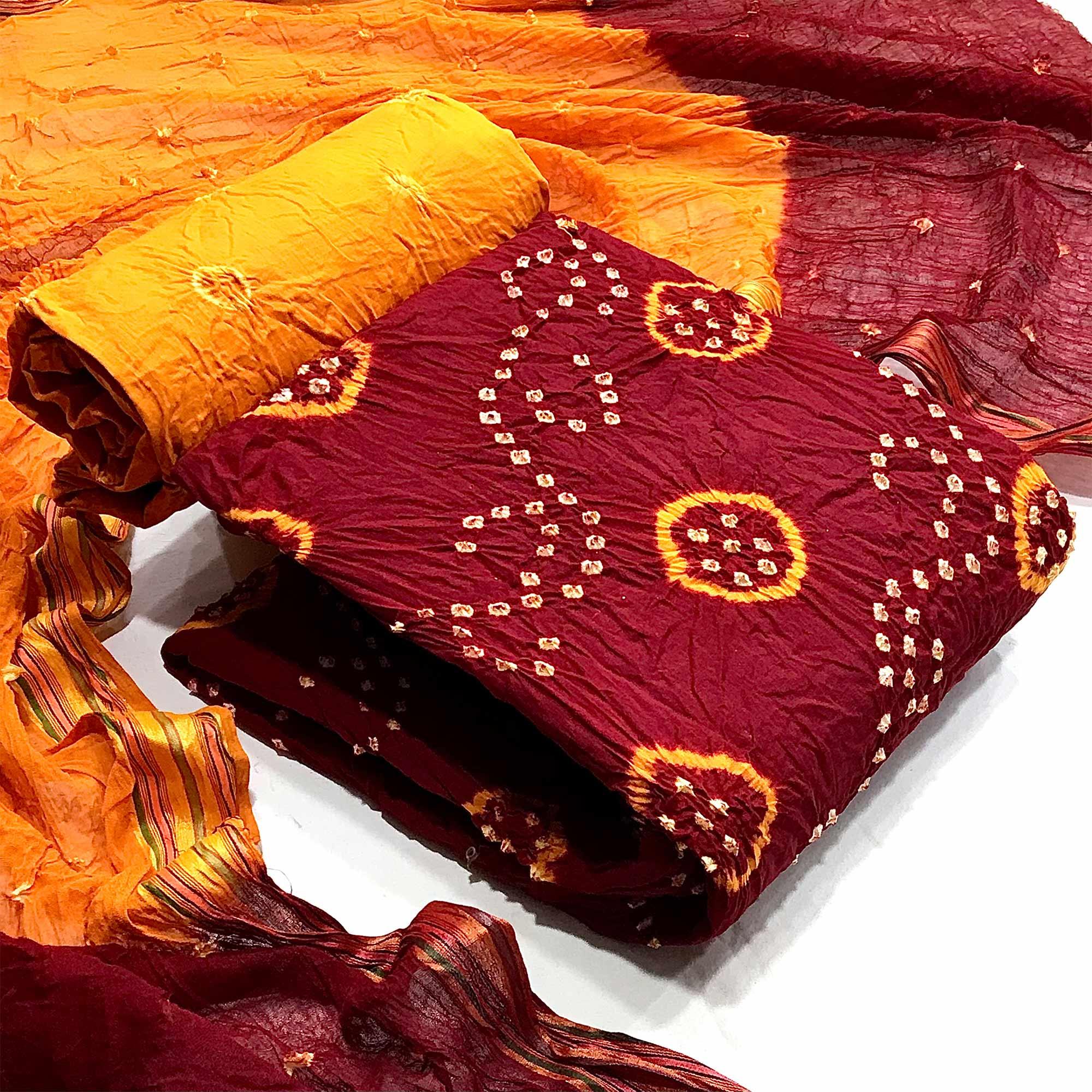 Maroon Bandhani Printed Pure Cotton Dress Material - Peachmode