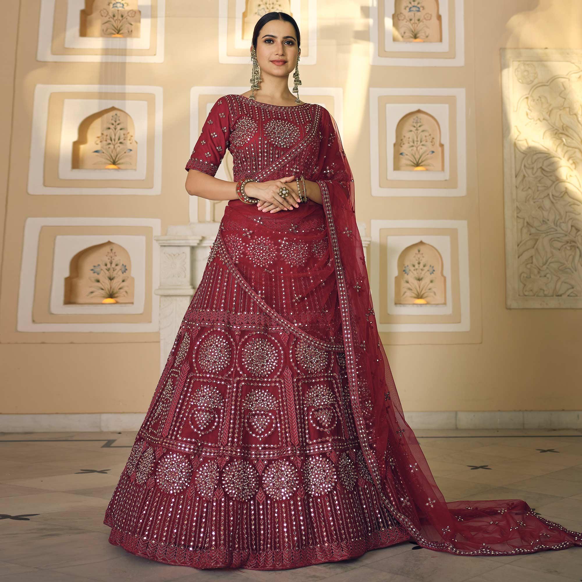 Maroon Wedding Wear Embellished Netted Lehenga Choli - Peachmode