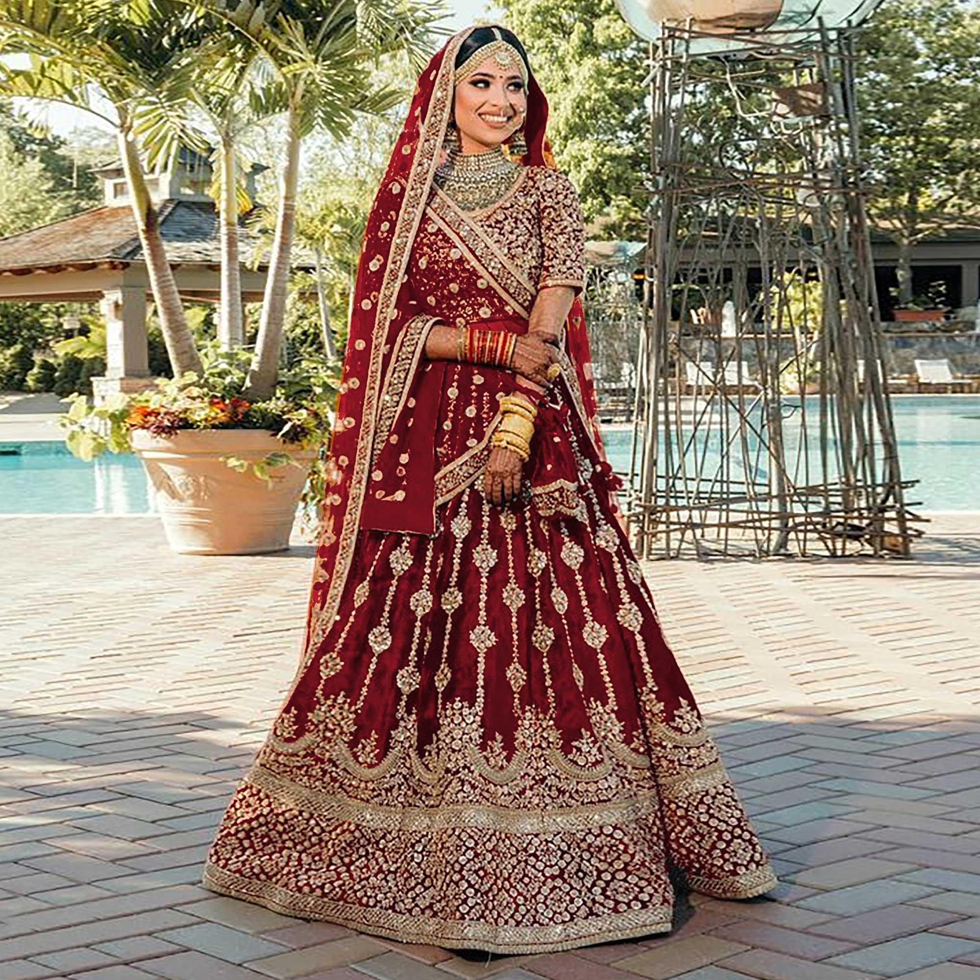 Maroon Wedding Wear Embroidered With Embellished Velvet Lehenga Choli - Peachmode