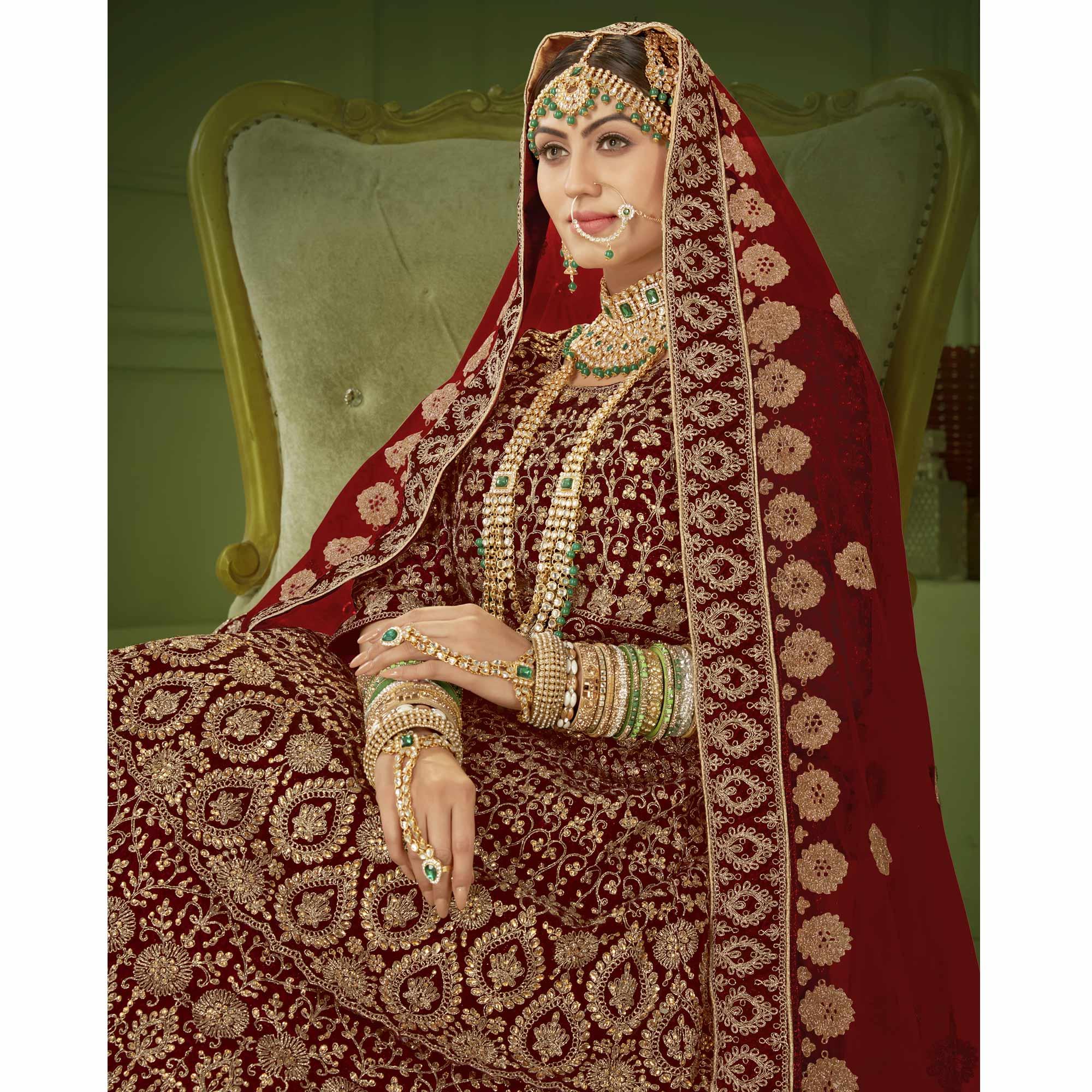 Maroon Wedding Wear Floral Coding Embroidery With Stone Velvet Lehenga Choli - Peachmode